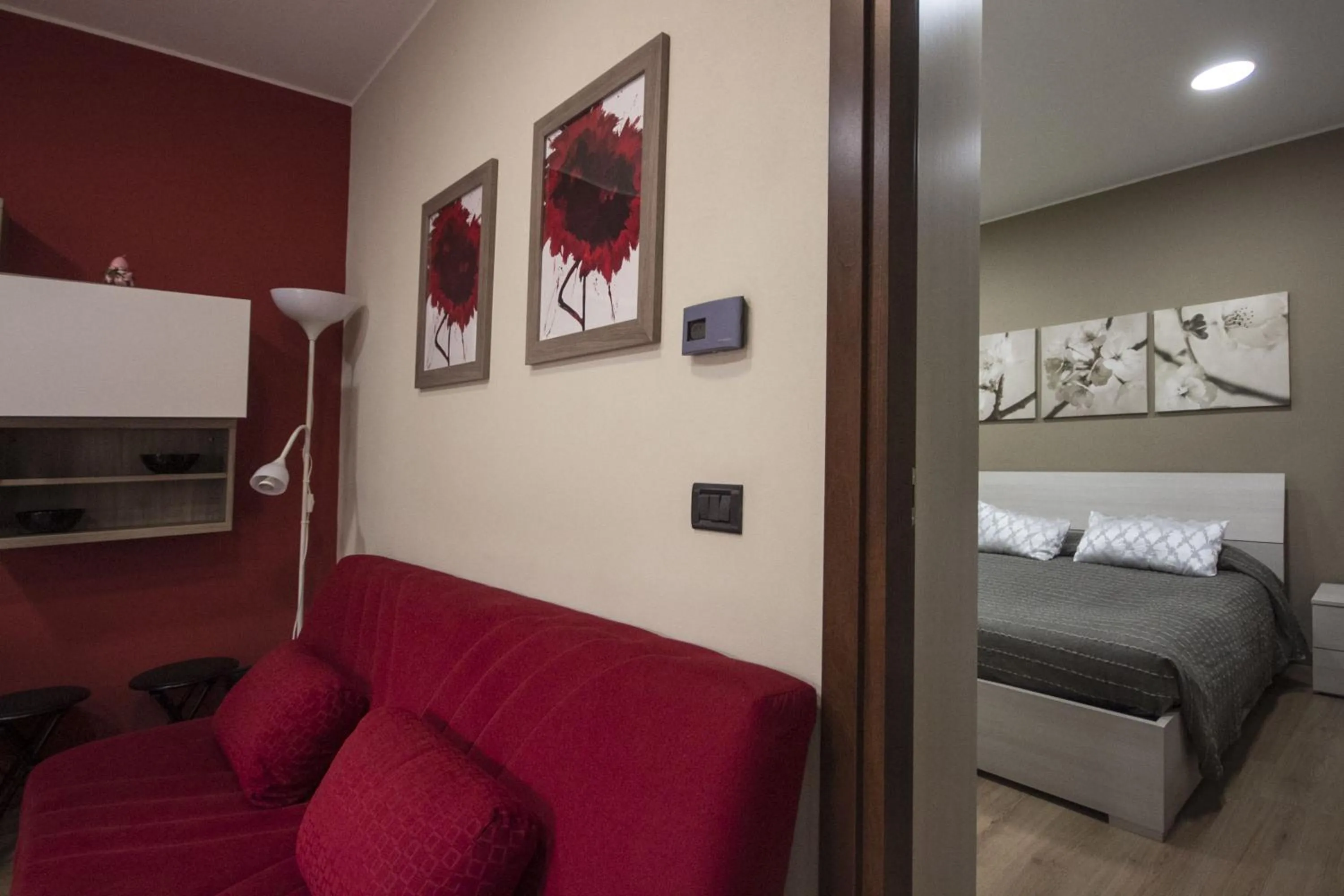 Living room, Bed in Appartamento Il Centro
