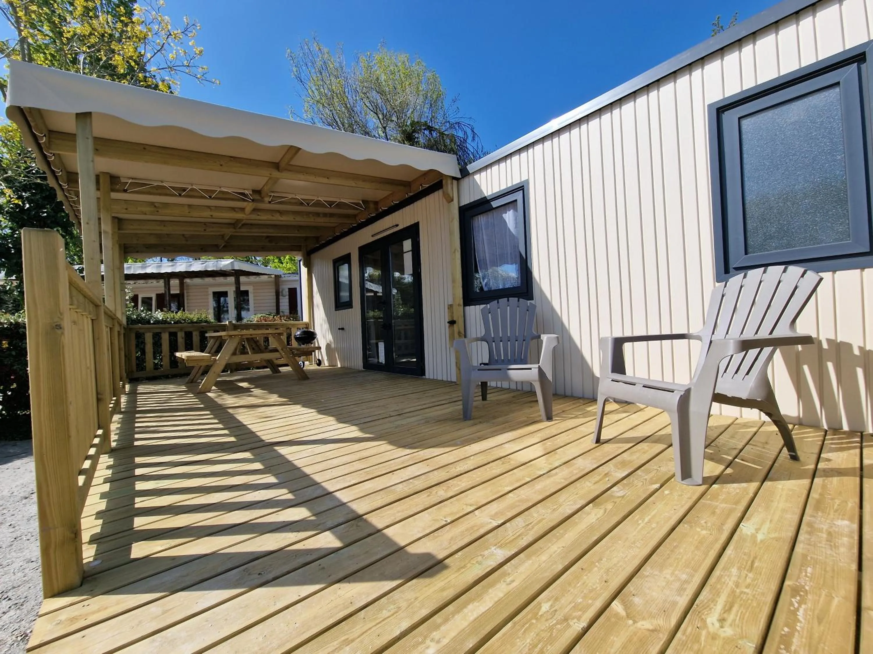 Property building in Camping Les P'tites Maisons dans la Prairie