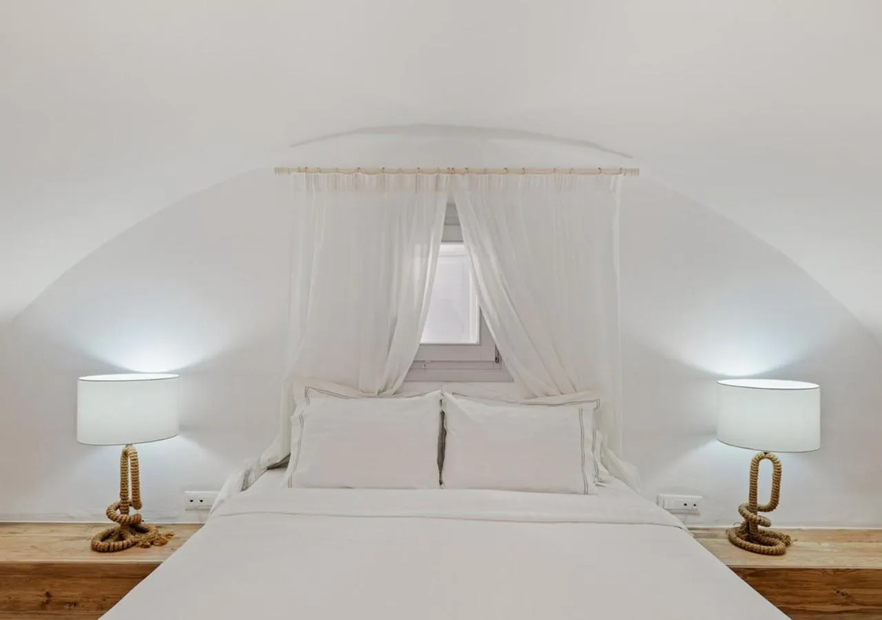 Bedroom, Bed in Orabel Suites Santorini (Adults Only)