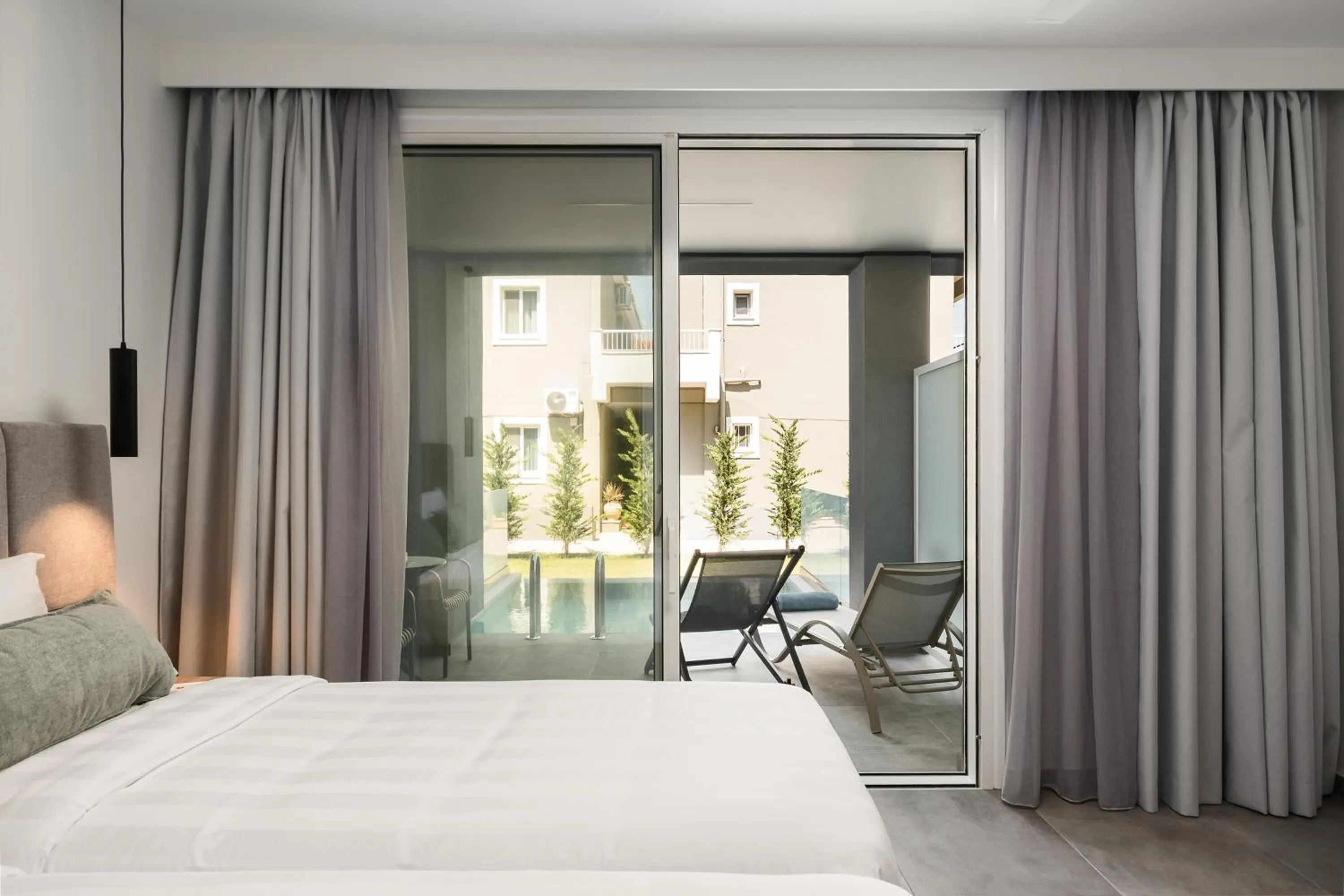 Pool view, Bed in Acharavi Beach Hotel