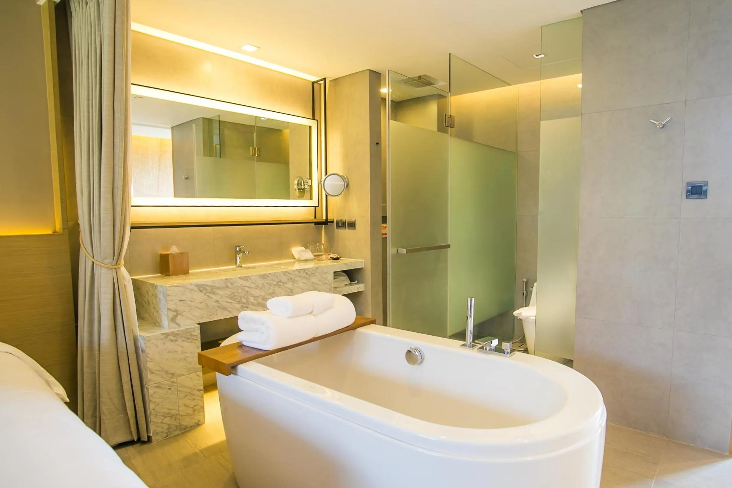 Bathroom, Bed in dusitD2 Khao Yai