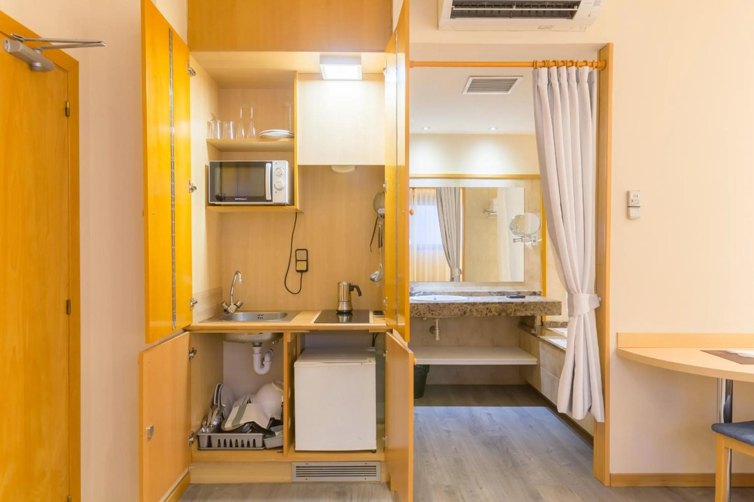 Kitchen or kitchenette in Apartamentos DV