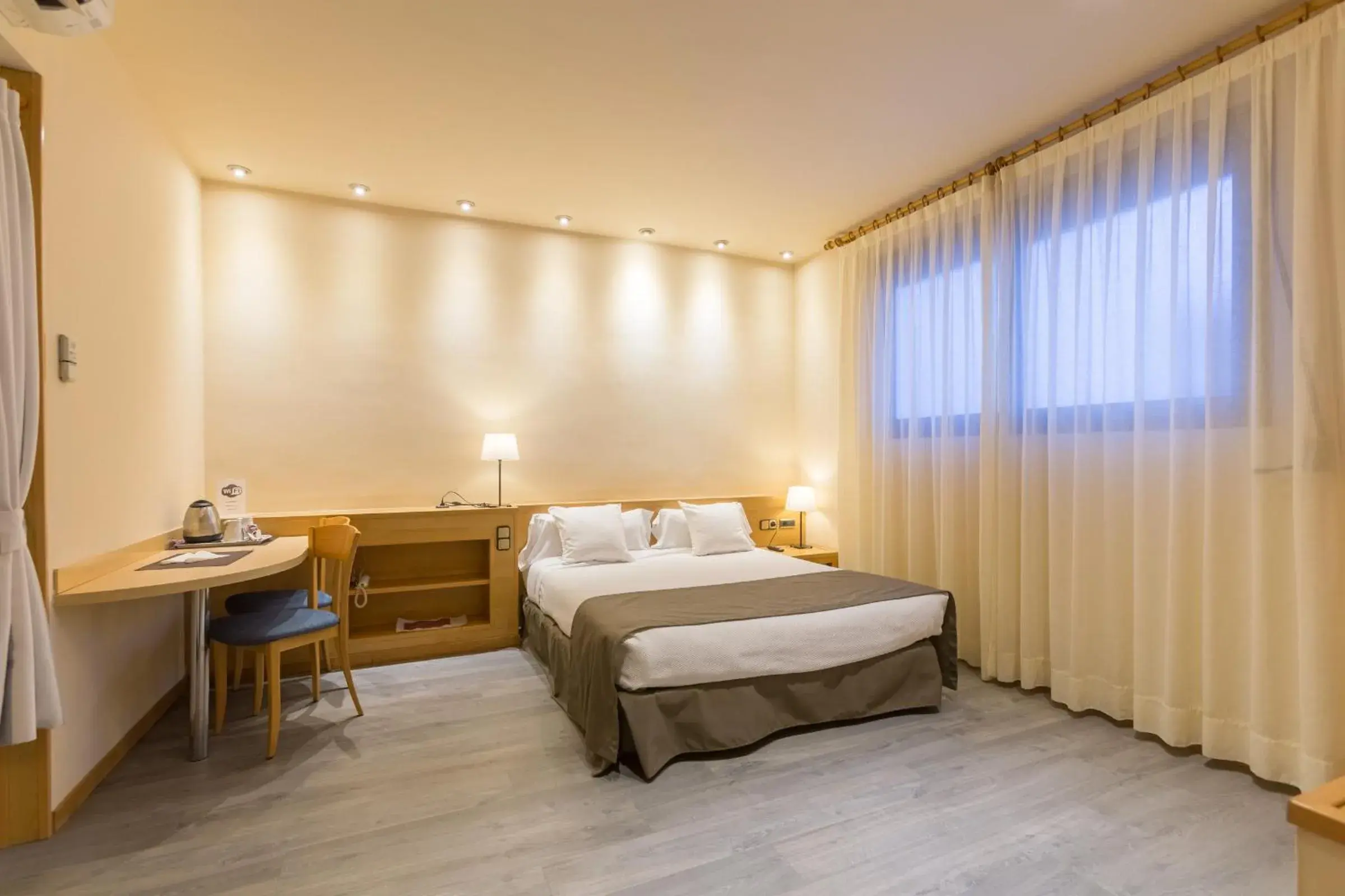 Photo of the whole room, Bed in Apartamentos DV Photo of the whole room, Bed in Apartamentos DV