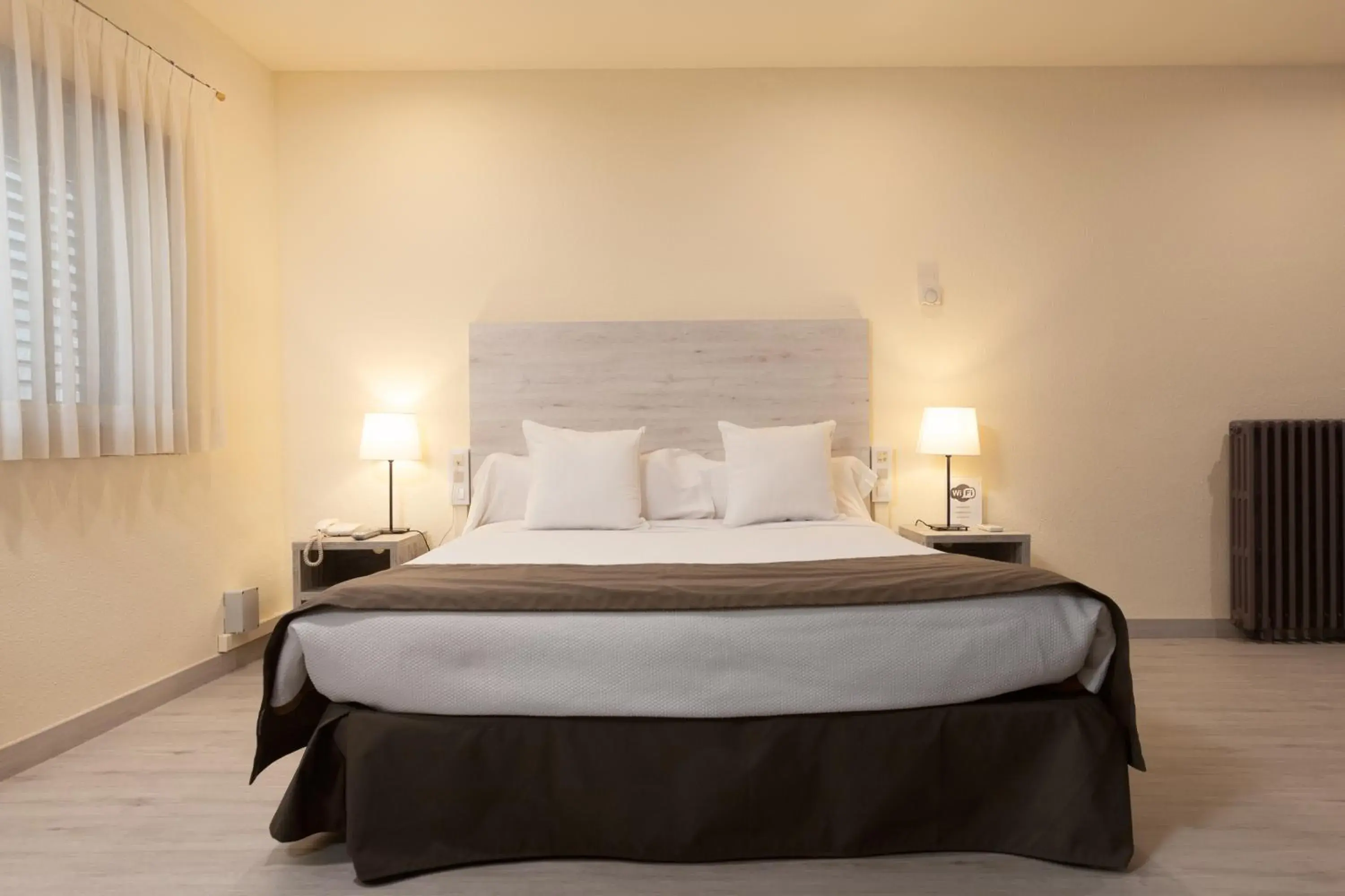 Bed in Apartamentos DV Bed in Apartamentos DV