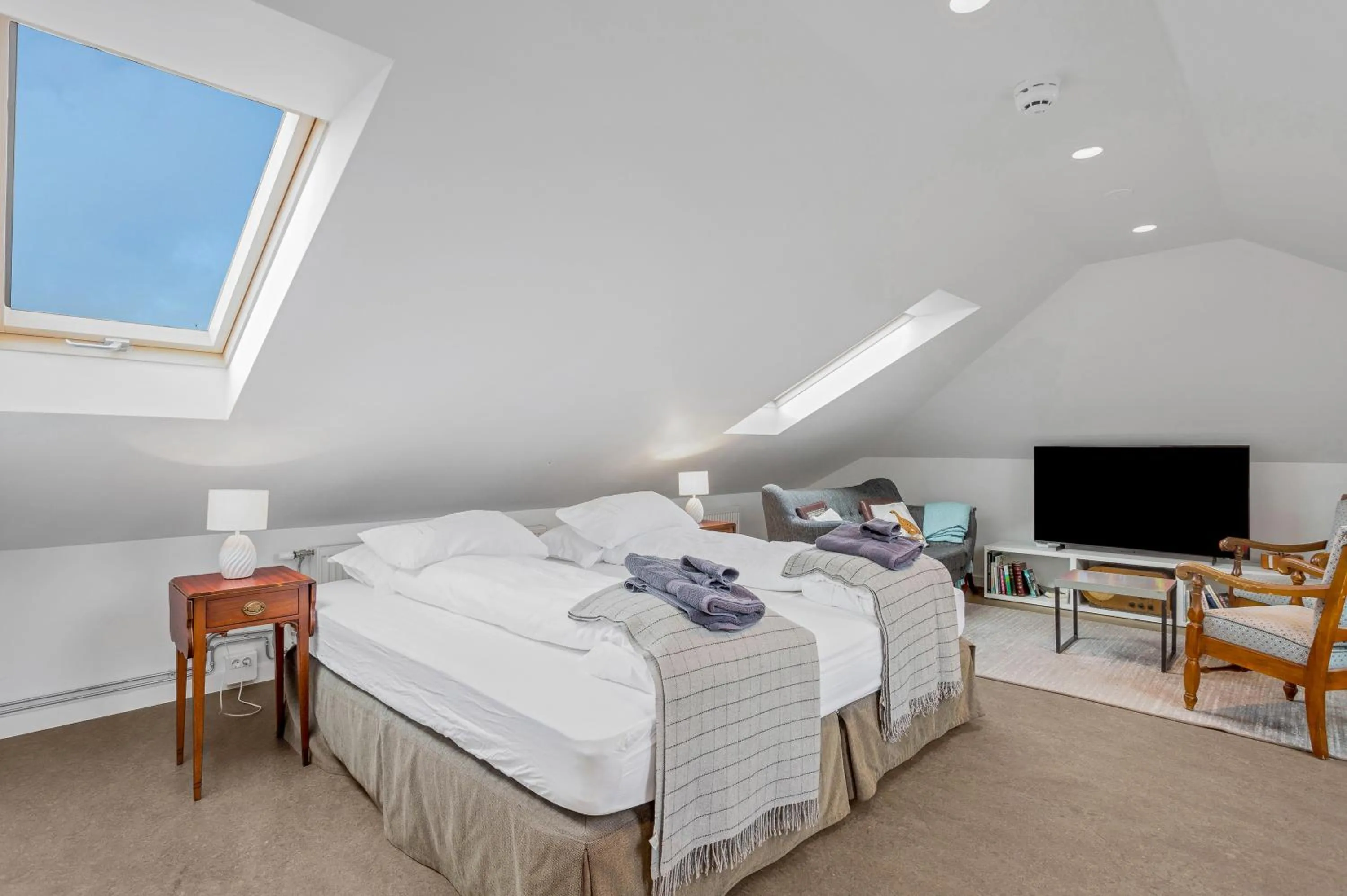 Bed in Freyja Guesthouse & Suites