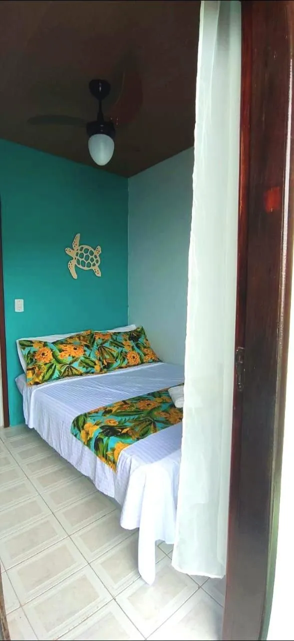 Bed in Pousada Toca do Mar