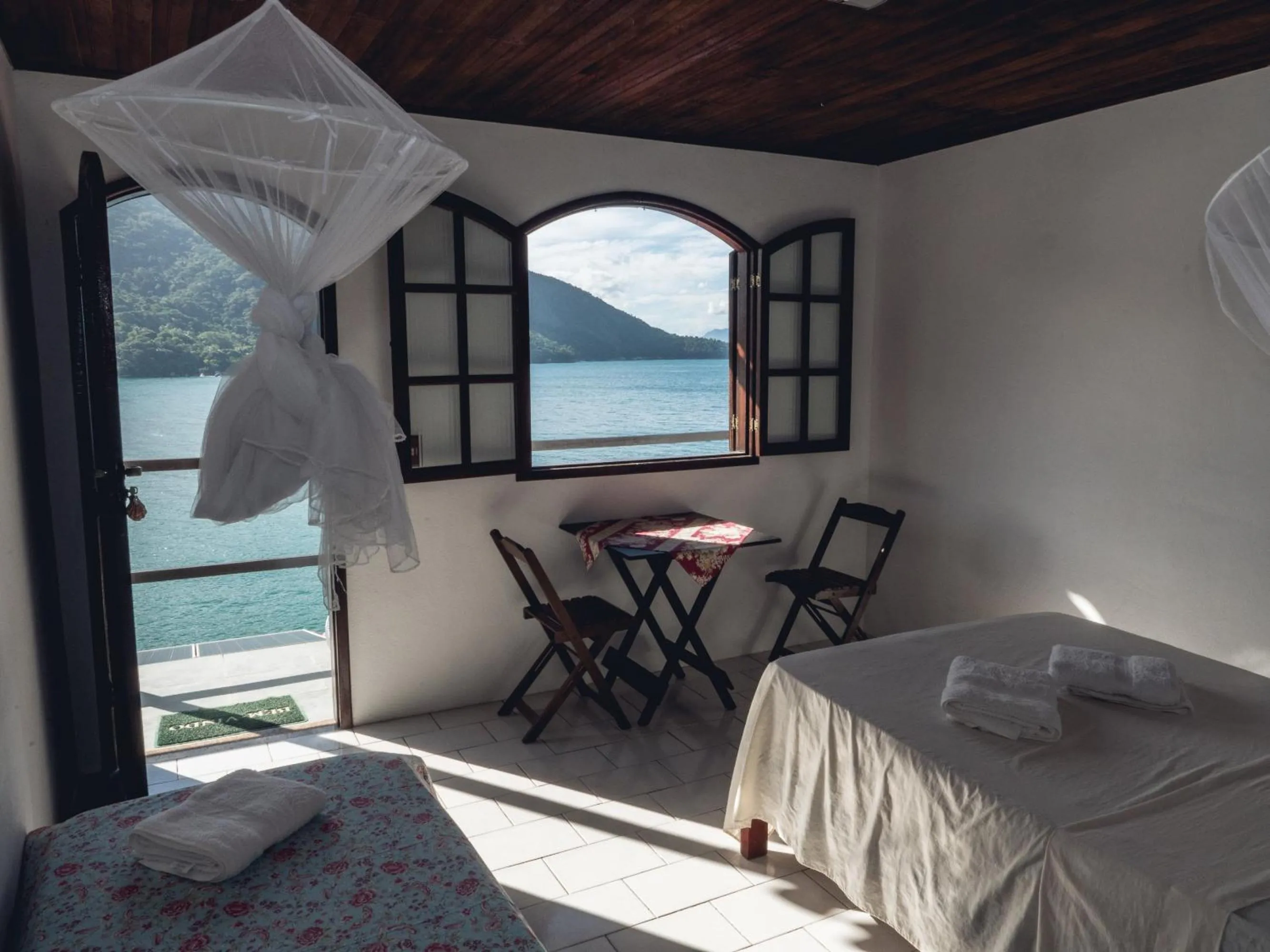 Bed in Pousada Toca do Mar