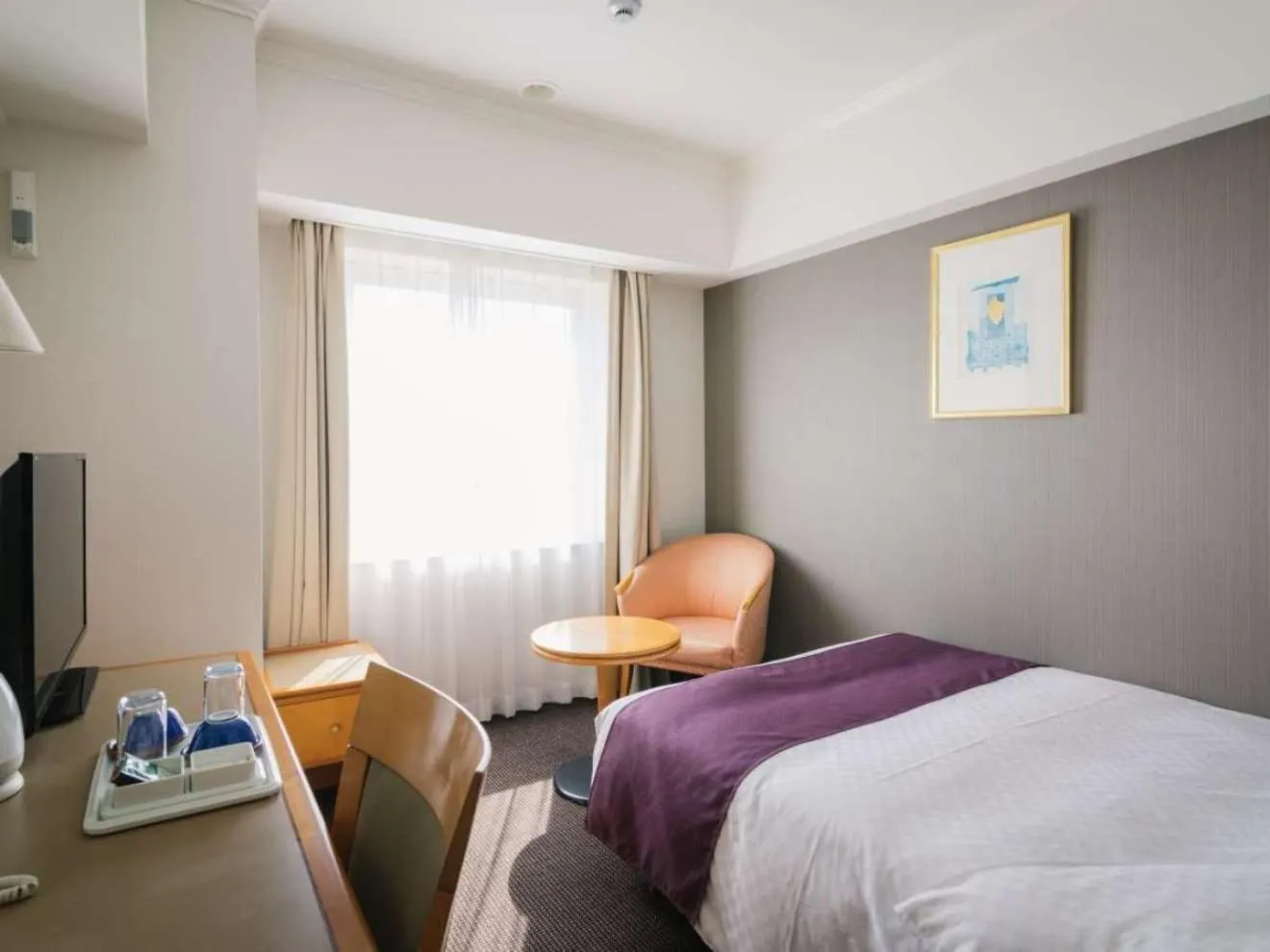 Photo of the whole room, Bed in JR Hotel Clement Uwajima