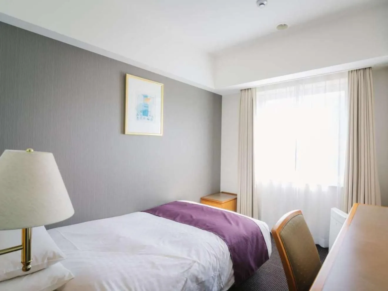 Photo of the whole room, Bed in JR Hotel Clement Uwajima