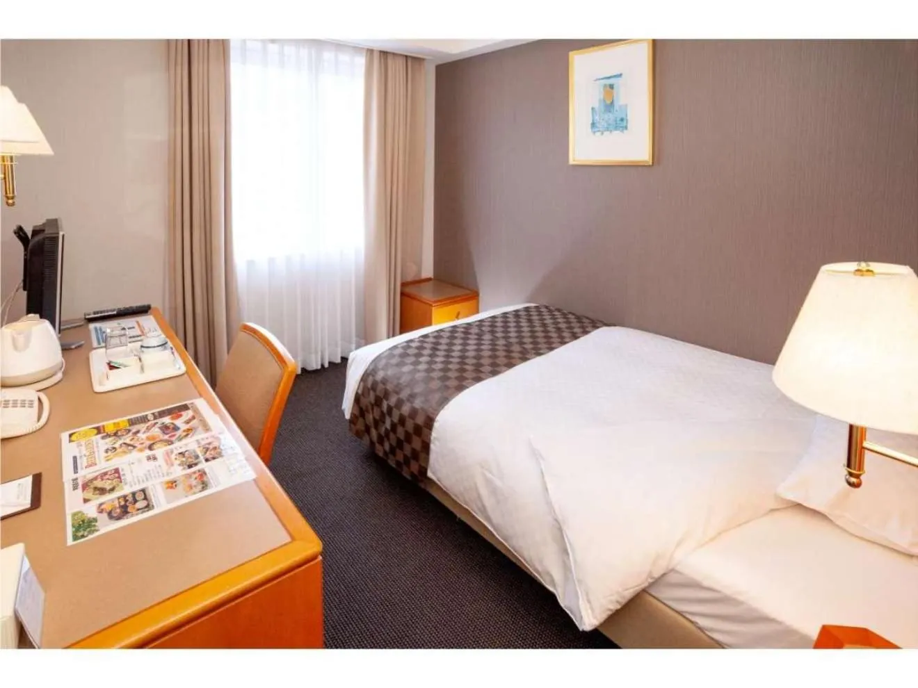 Photo of the whole room, Bed in JR Hotel Clement Uwajima