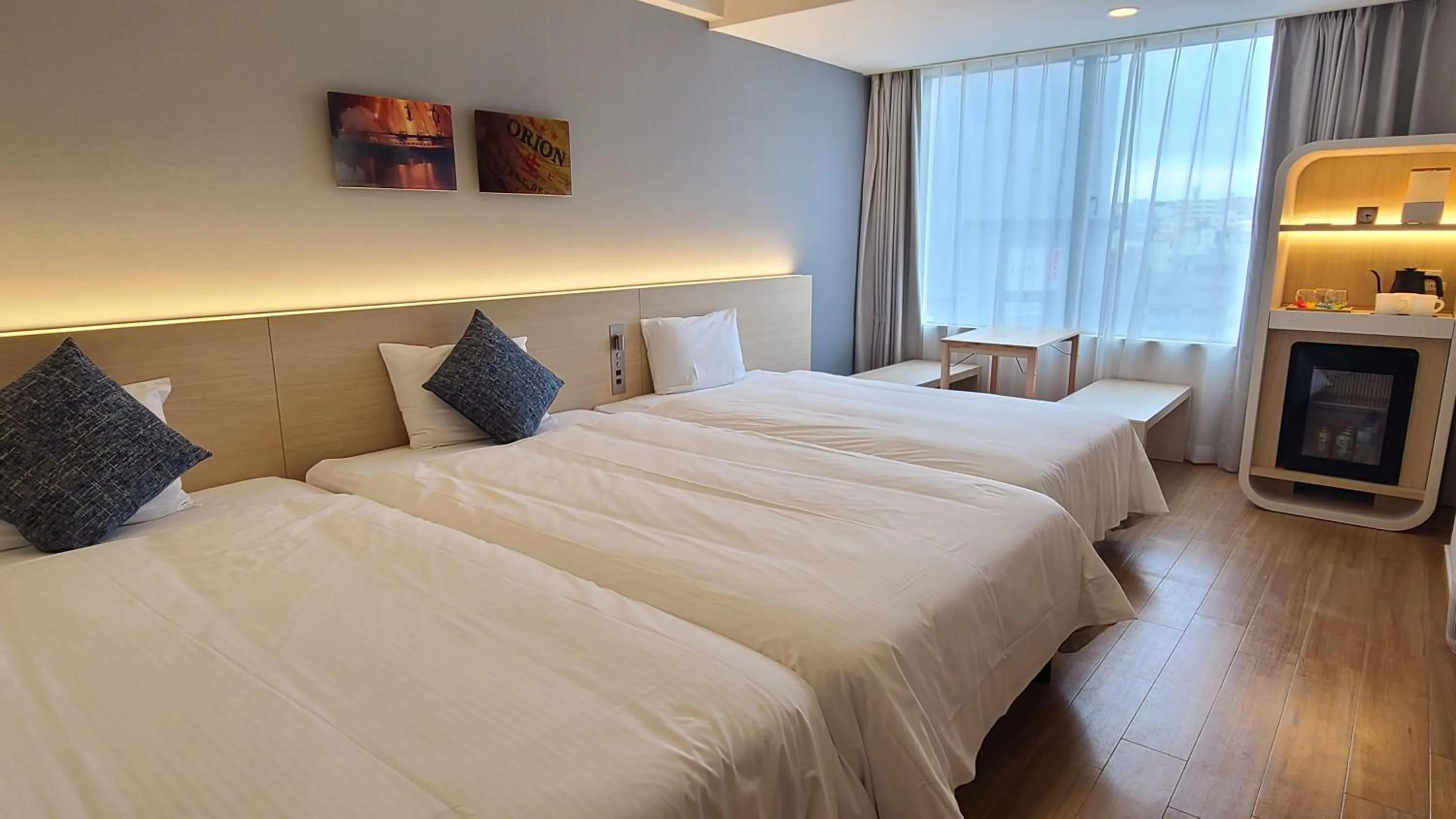 Photo of the whole room, Bed in 琉球オリオンホテル 那覇国際通り