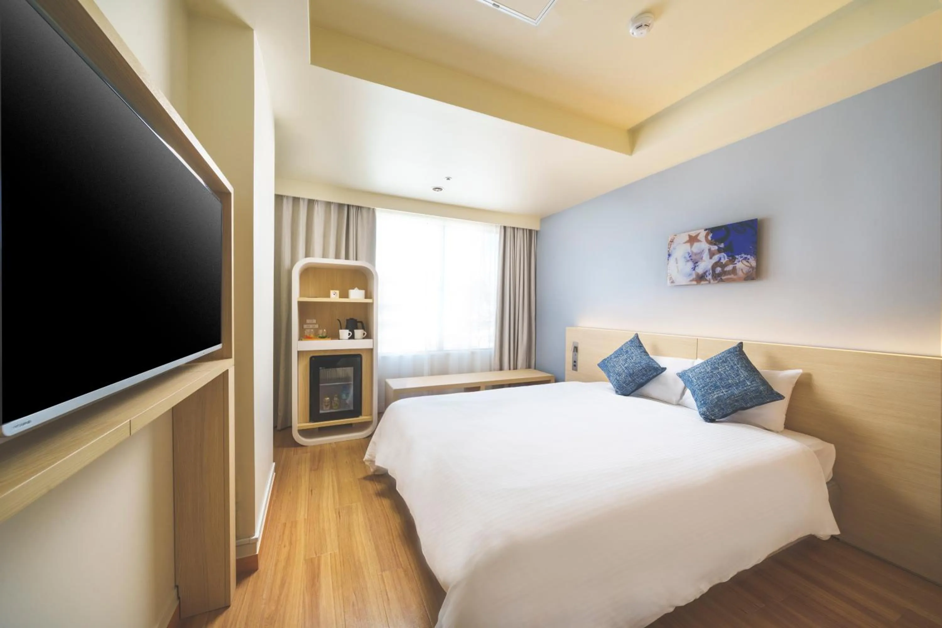 Photo of the whole room, Bed in 琉球オリオンホテル 那覇国際通り