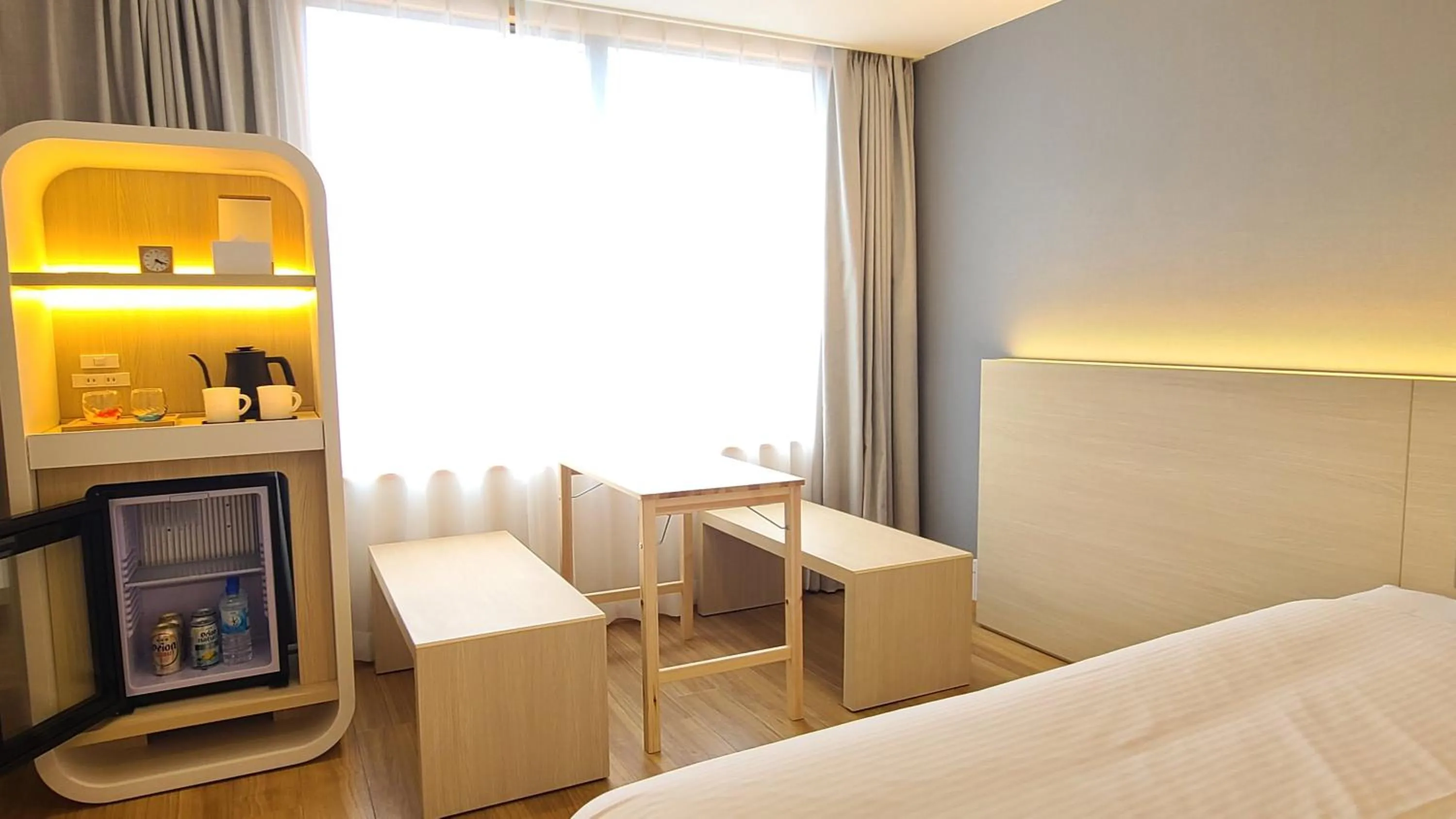 Seating area, Bed in 琉球オリオンホテル 那覇国際通り