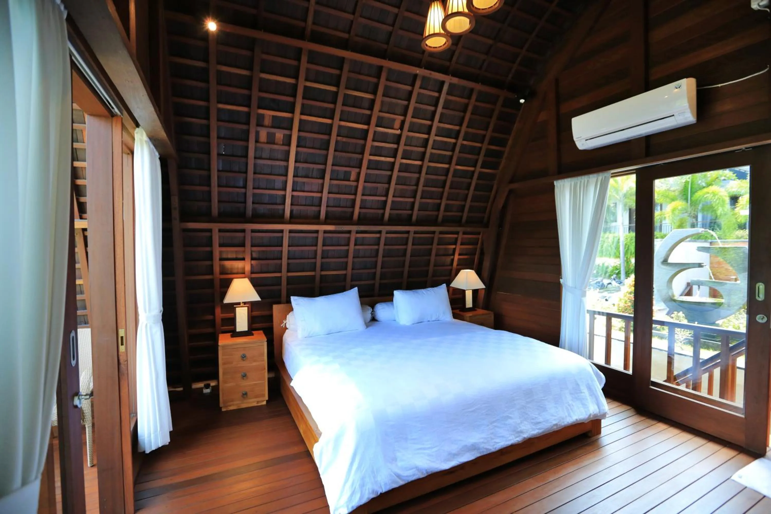 Bed in Raja Woods Villa