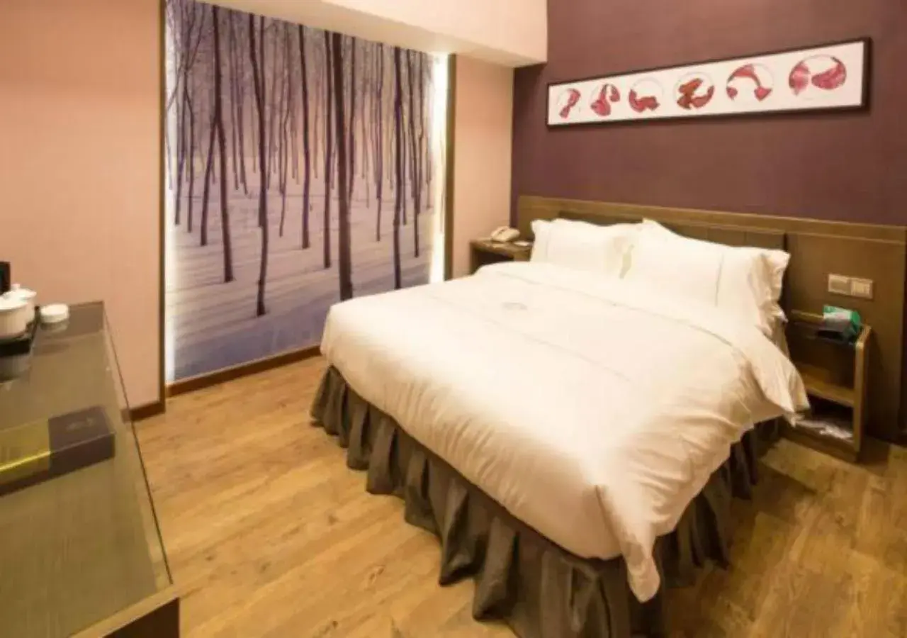 Bed in lnsail Hotel Shenzhen Luohu Port Railway Station Bed in lnsail Hotel Shenzhen Luohu Port Railway Station