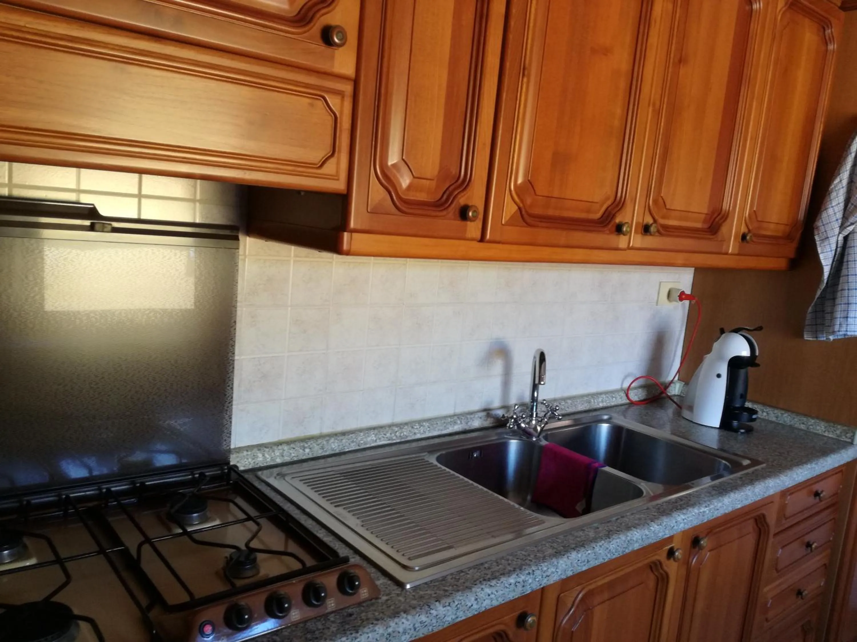 Communal kitchen in B&B Casa degli Ulivi