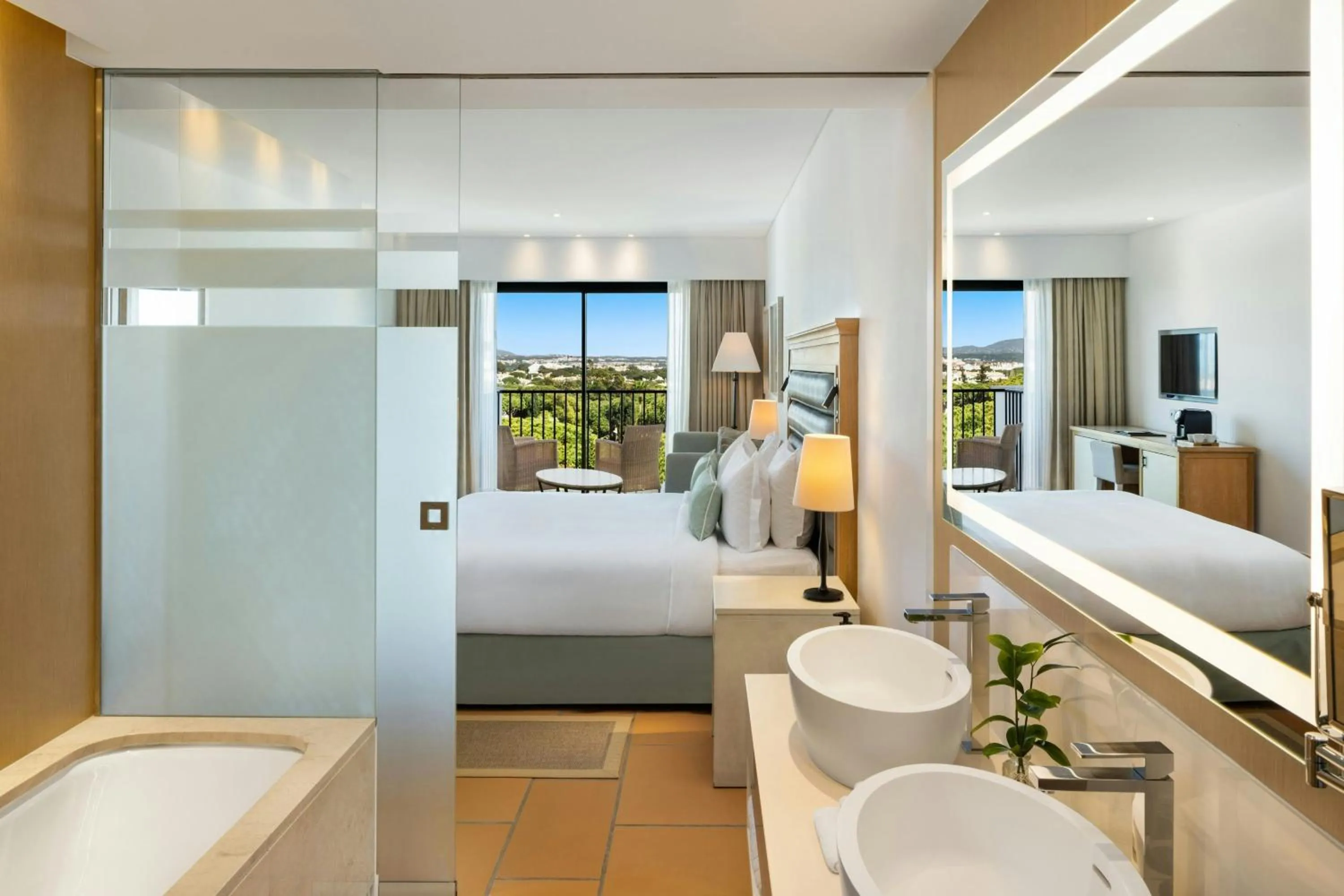 Bathroom, Bed in Pine Cliffs Ocean Suites, a Luxury Collection Resort & Spa, Algarve