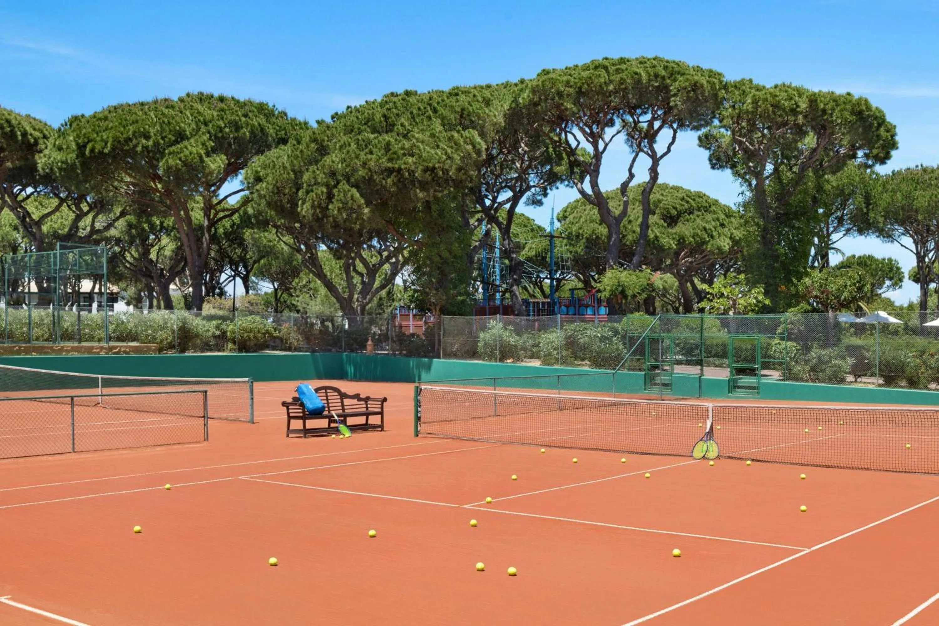 Tennis court in Pine Cliffs Ocean Suites, a Luxury Collection Resort & Spa, Algarve