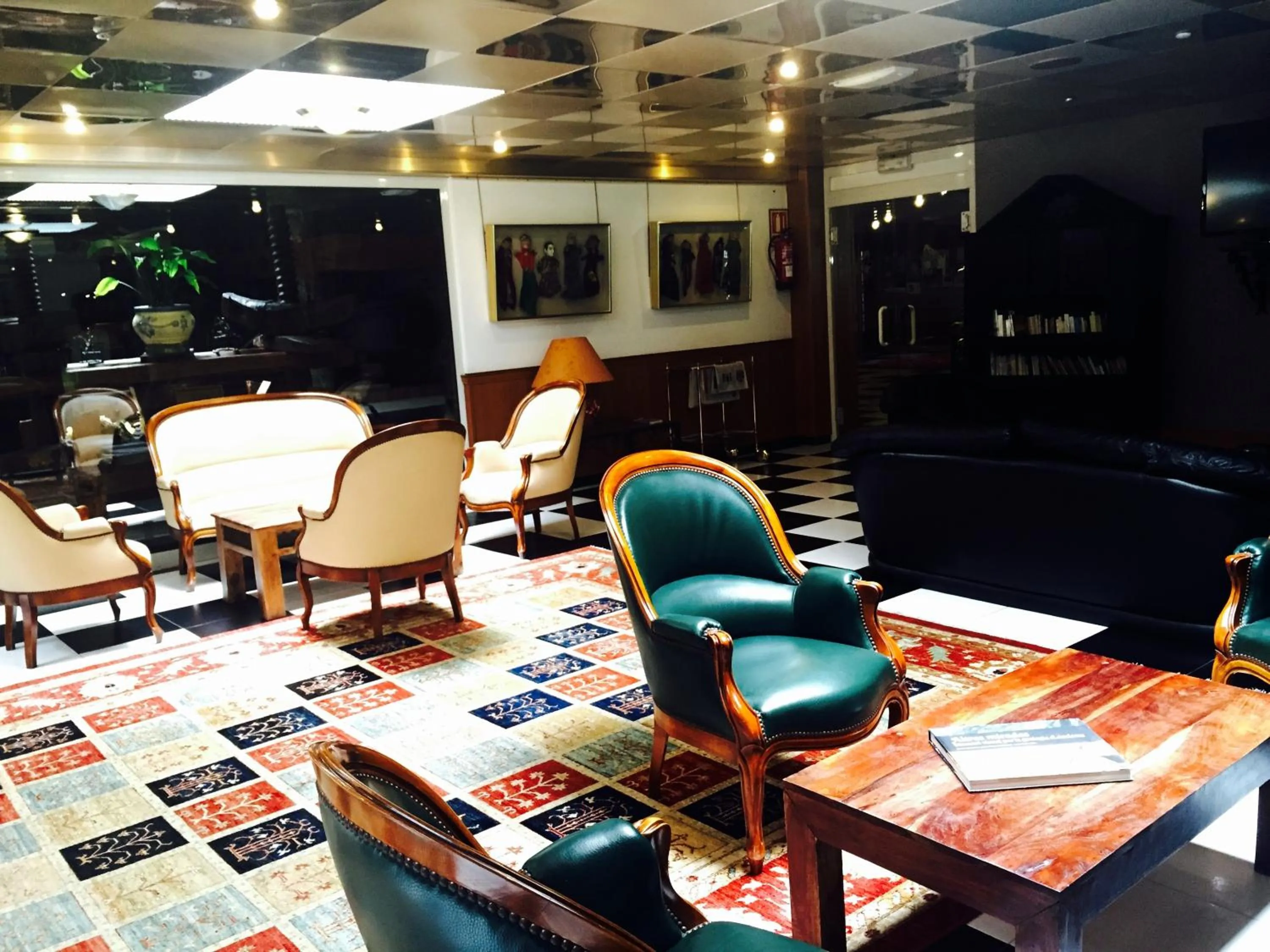 Communal lounge/ TV room in Hotel & SPA Llop Gris