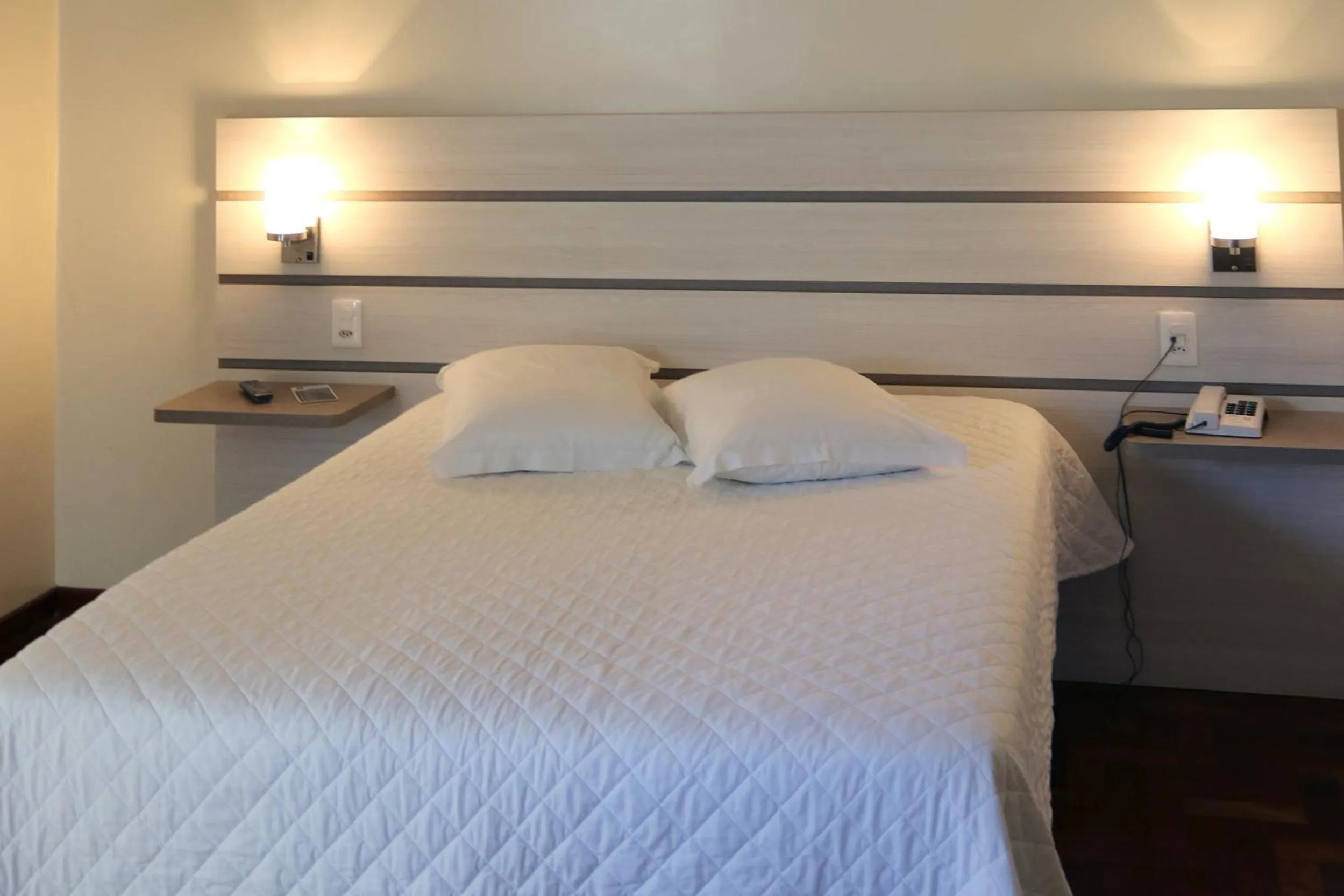 Bed in Tri Hotel Xanxerê