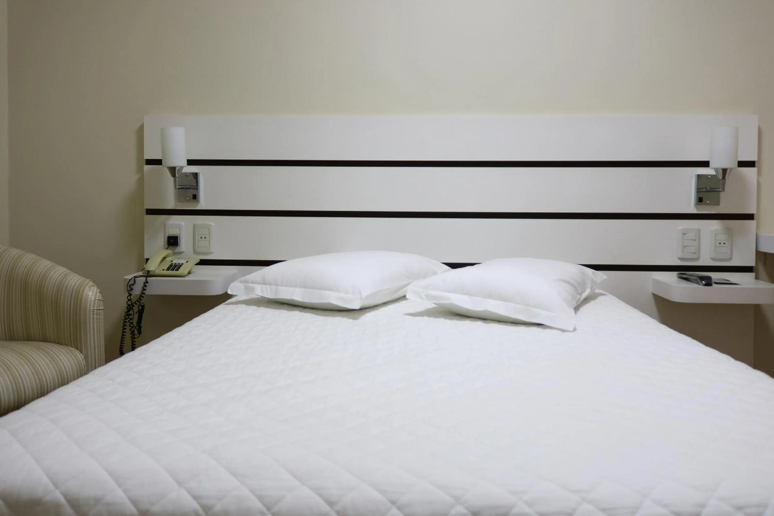 Bed in Tri Hotel Xanxerê