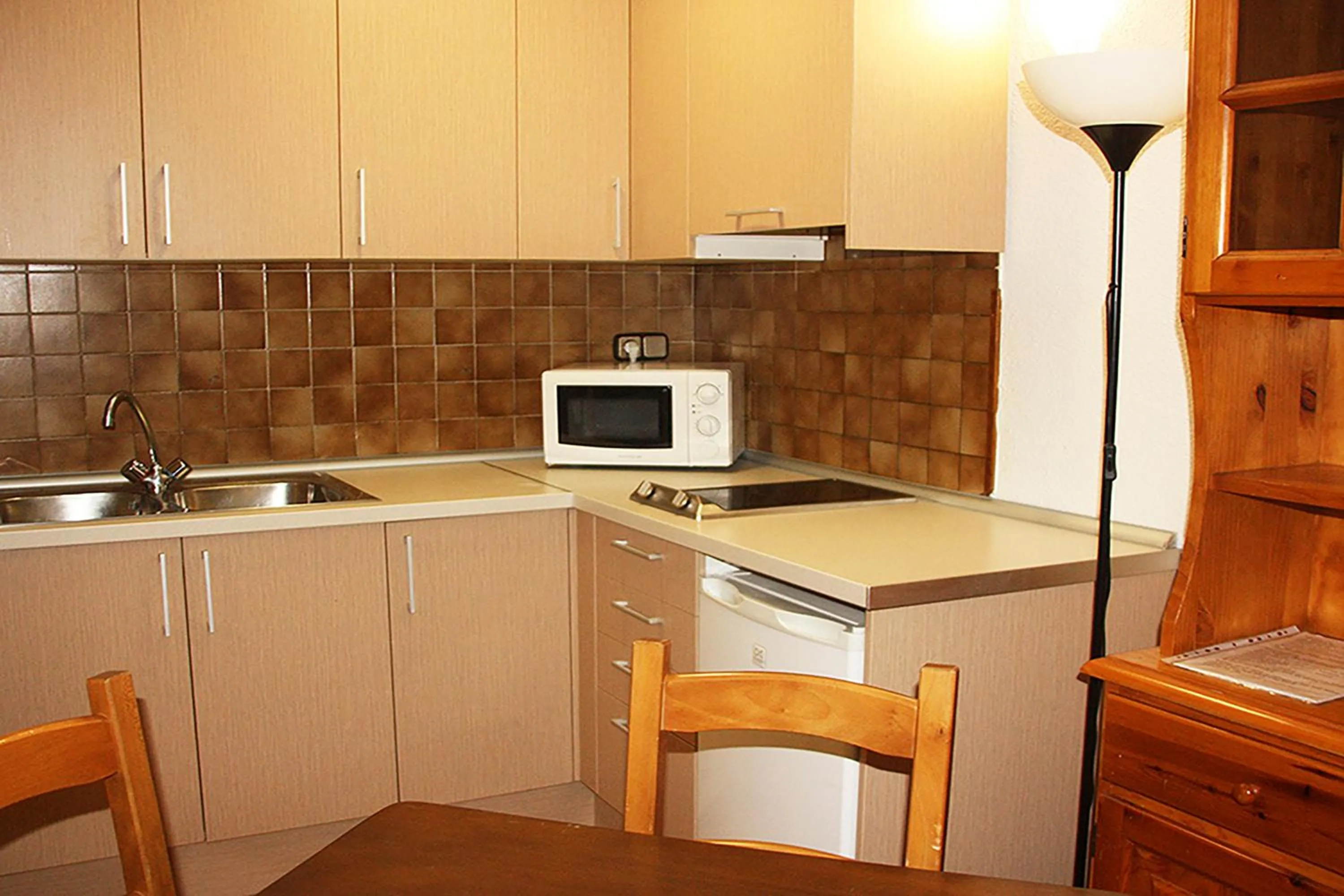 Kitchen or kitchenette in Estudis Turístics Cims Pas 3000