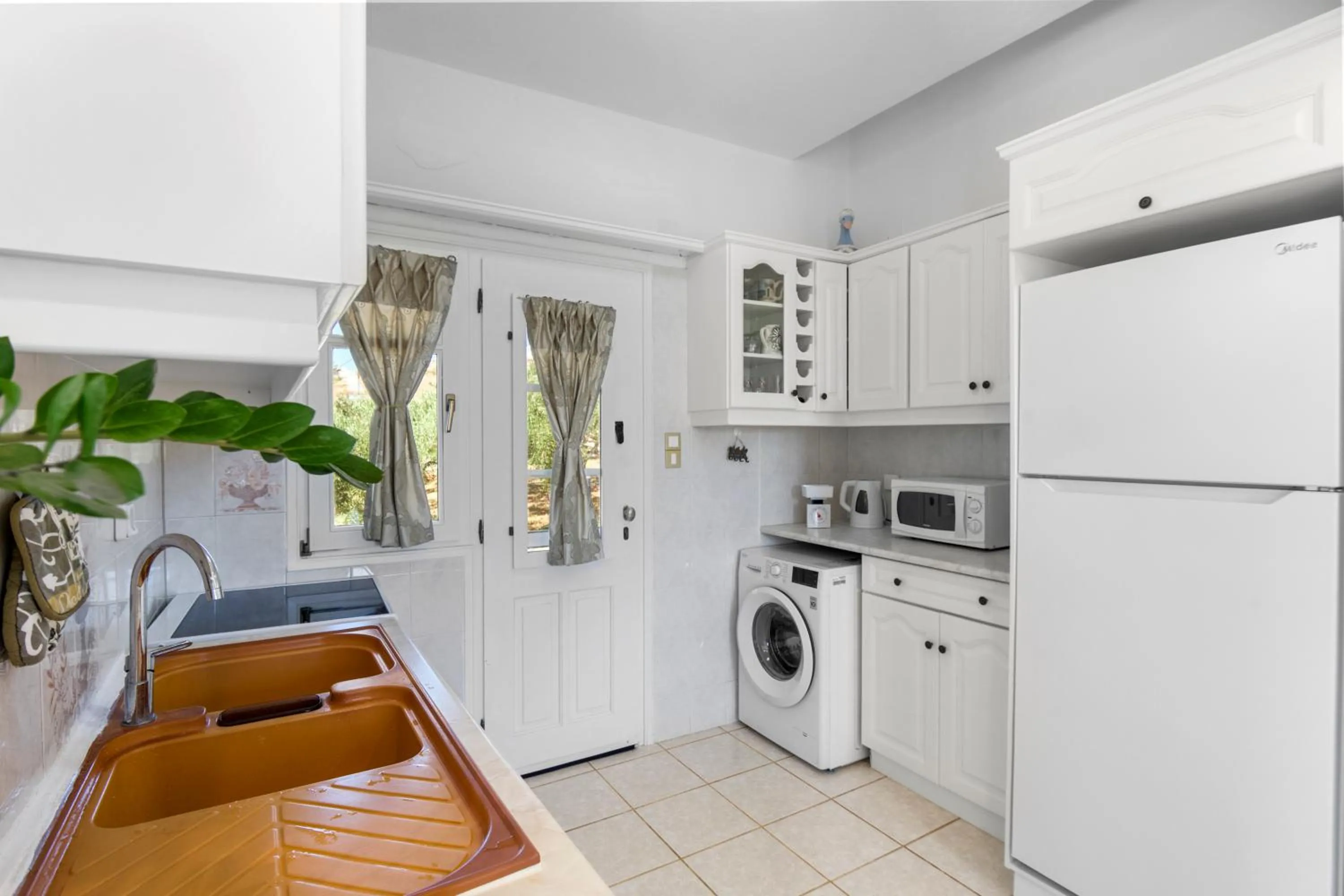 Kitchen or kitchenette in Anthoula's Sea View Apartment