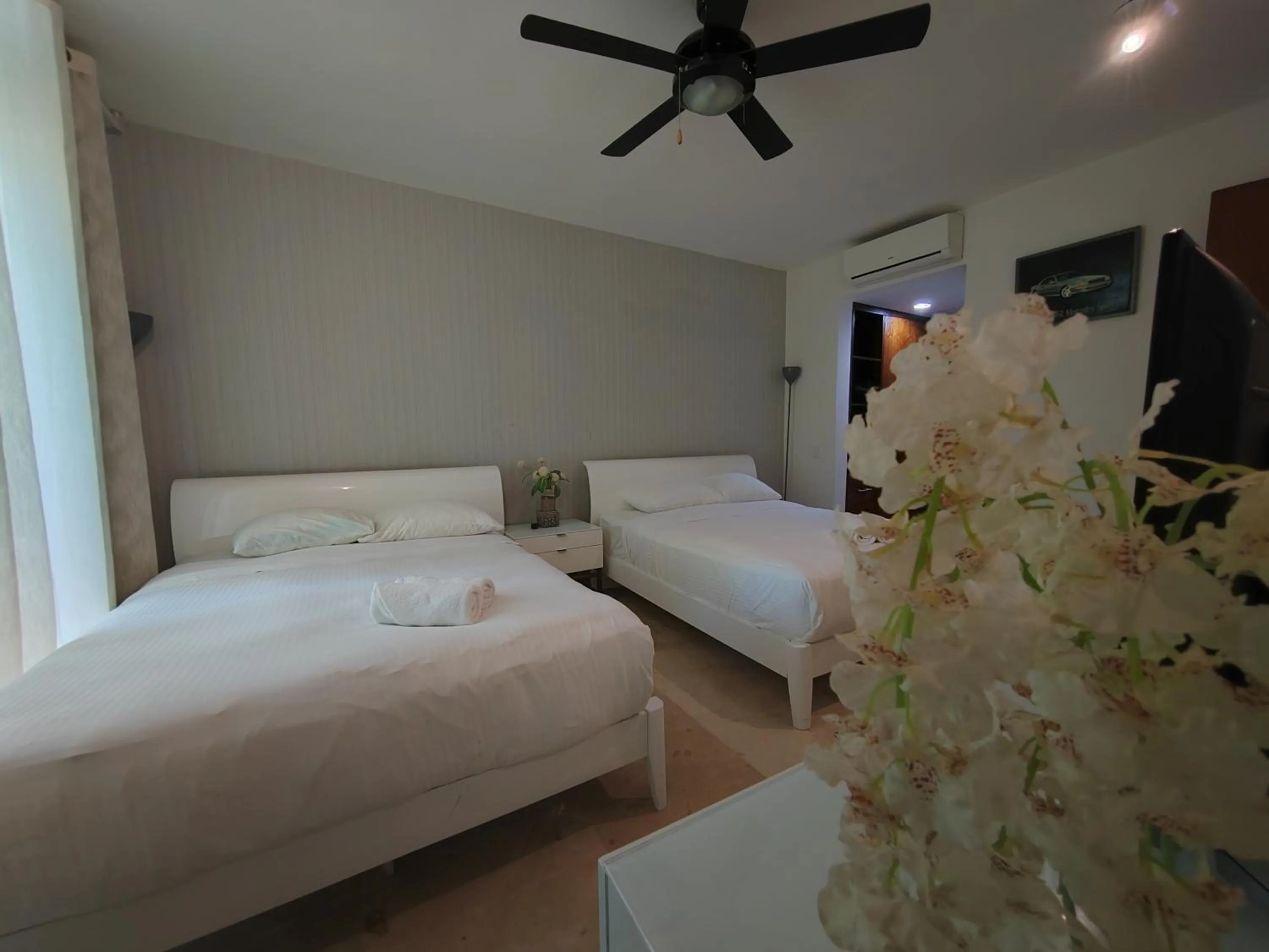 Bed in Luxurious & Central Condo In Playa Steps From The Beach