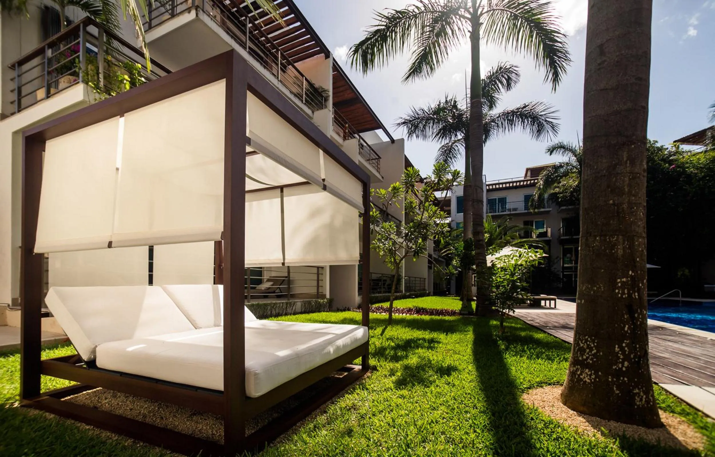 Swimming pool in Luxurious & Central Condo In Playa Steps From The Beach