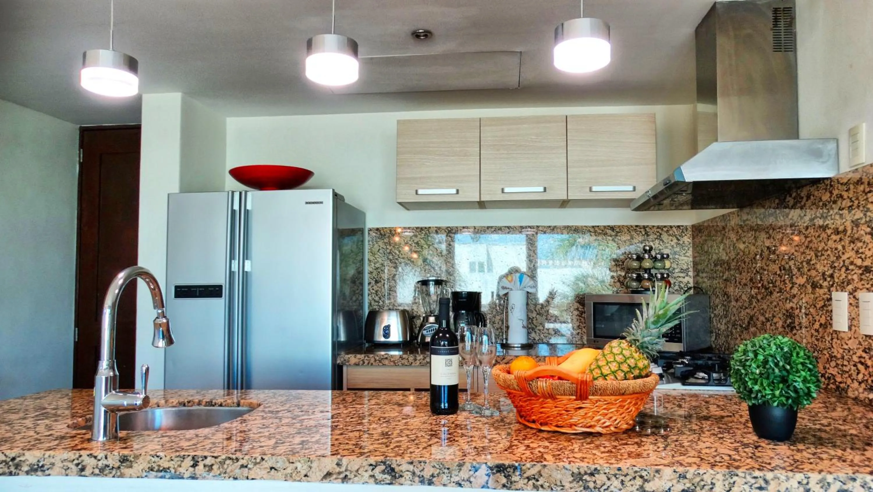 Kitchen or kitchenette in Luxurious & Central Condo In Playa Steps From The Beach
