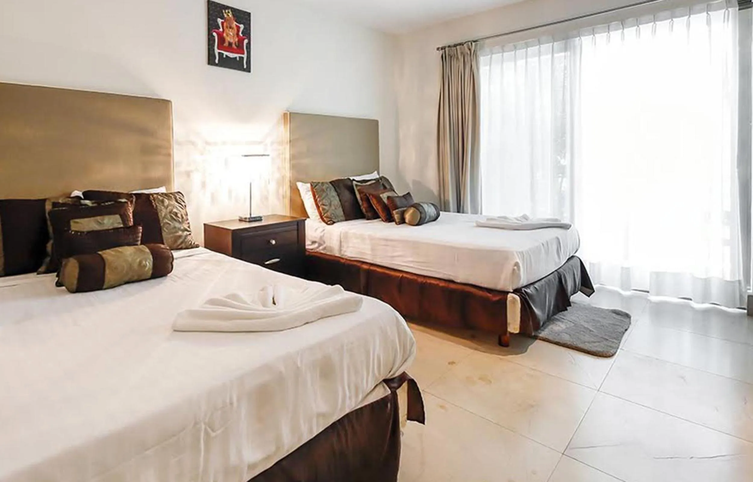 Bedroom, Bed in Luxurious & Central Condo In Playa Steps From The Beach