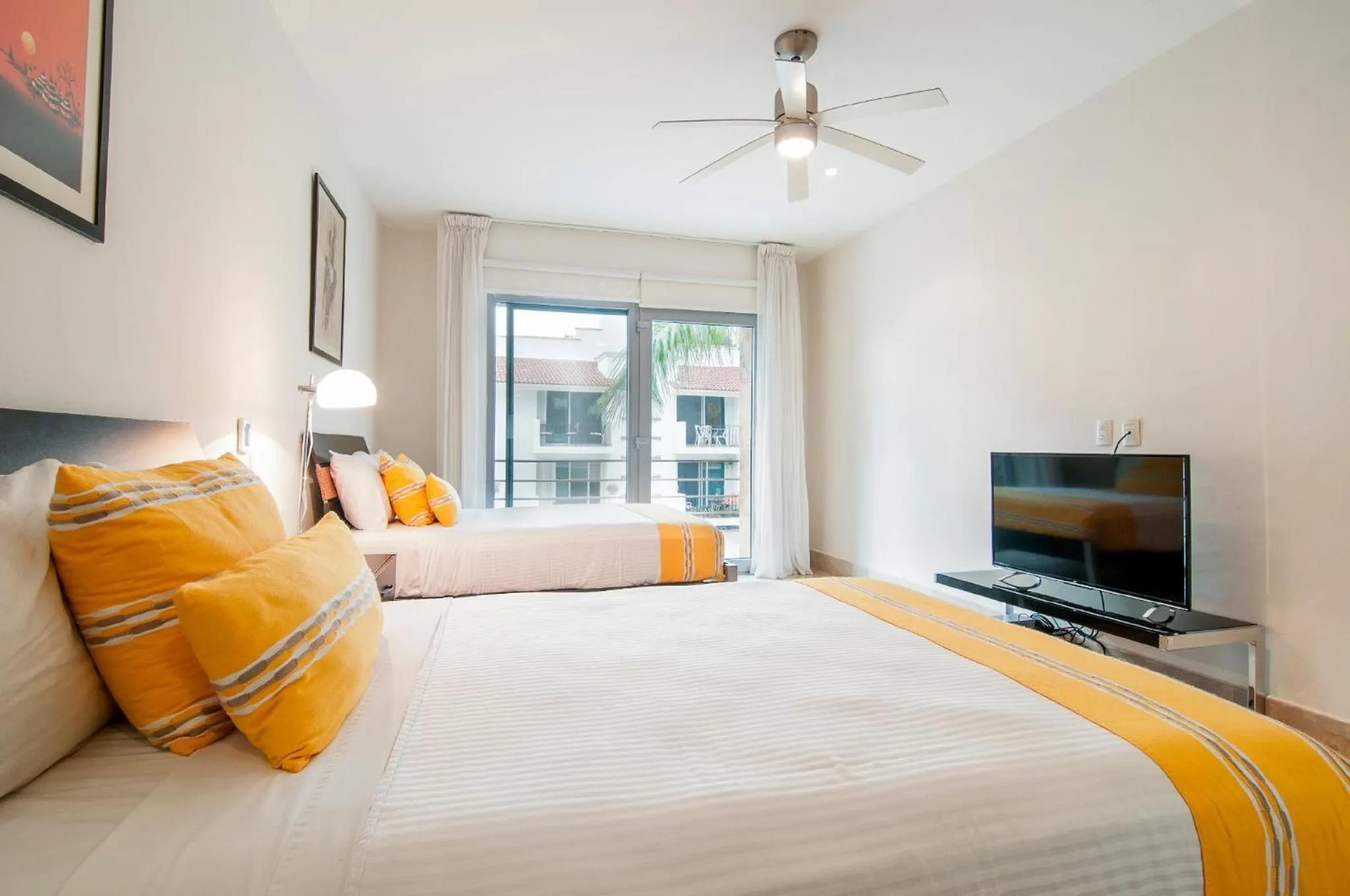 Bed in Luxurious & Central Condo In Playa Steps From The Beach