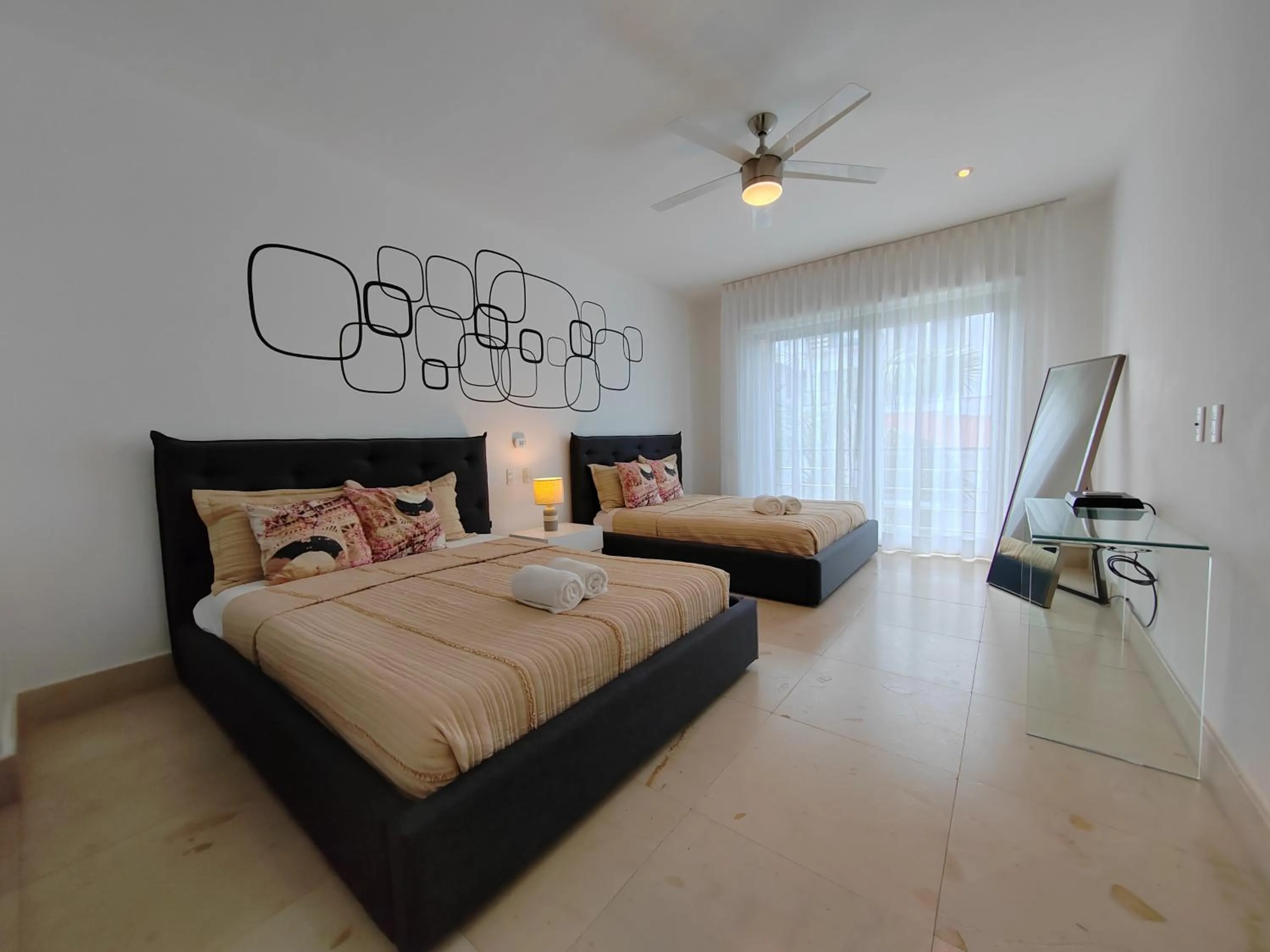 Bed in Luxurious & Central Condo In Playa Steps From The Beach