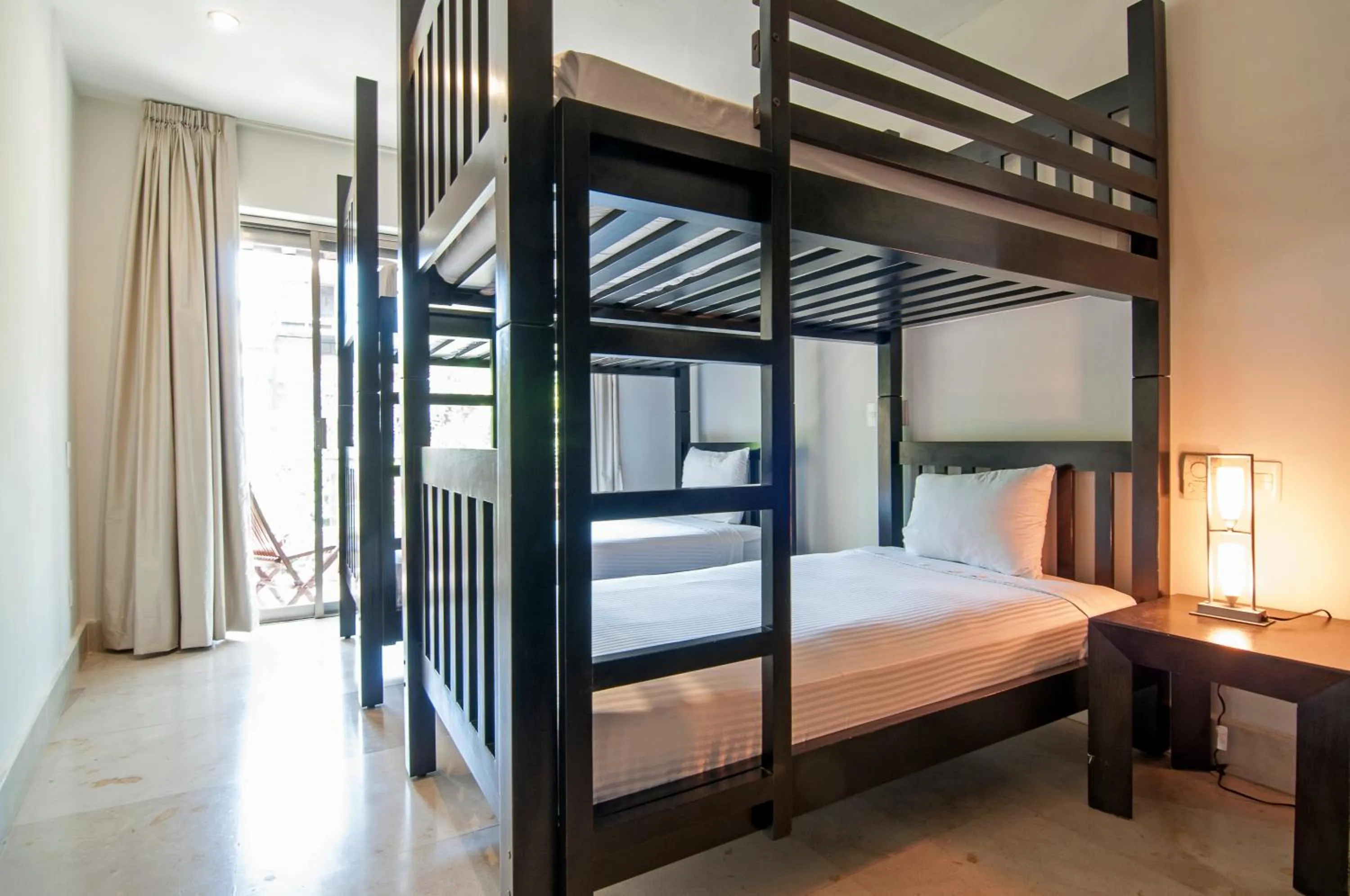 Bed in Luxurious & Central Condo In Playa Steps From The Beach