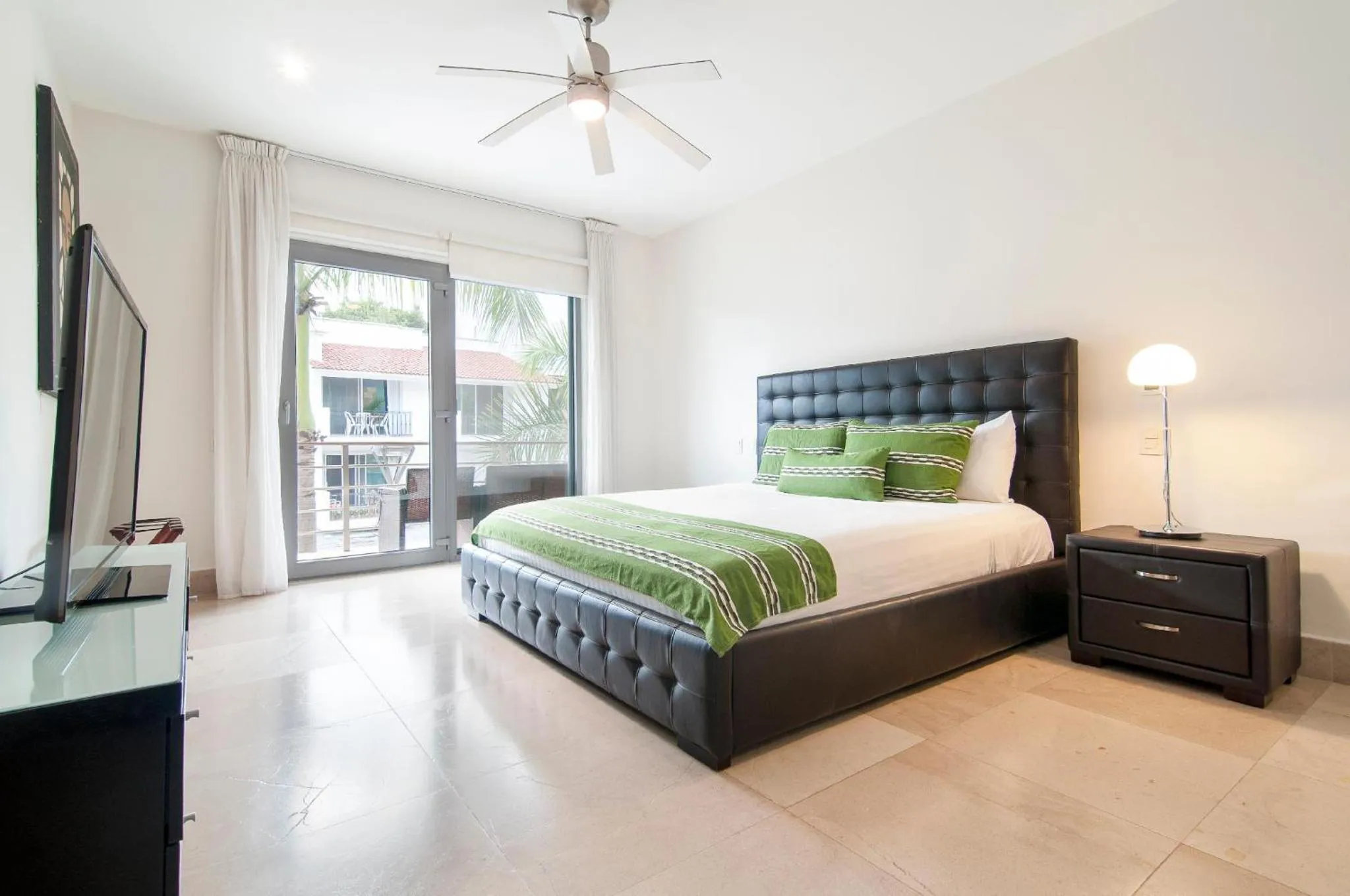 Bed in Luxurious & Central Condo In Playa Steps From The Beach
