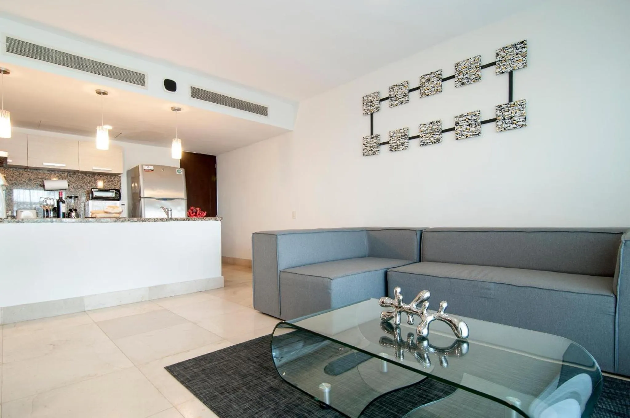 Living room in Luxurious & Central Condo In Playa Steps From The Beach