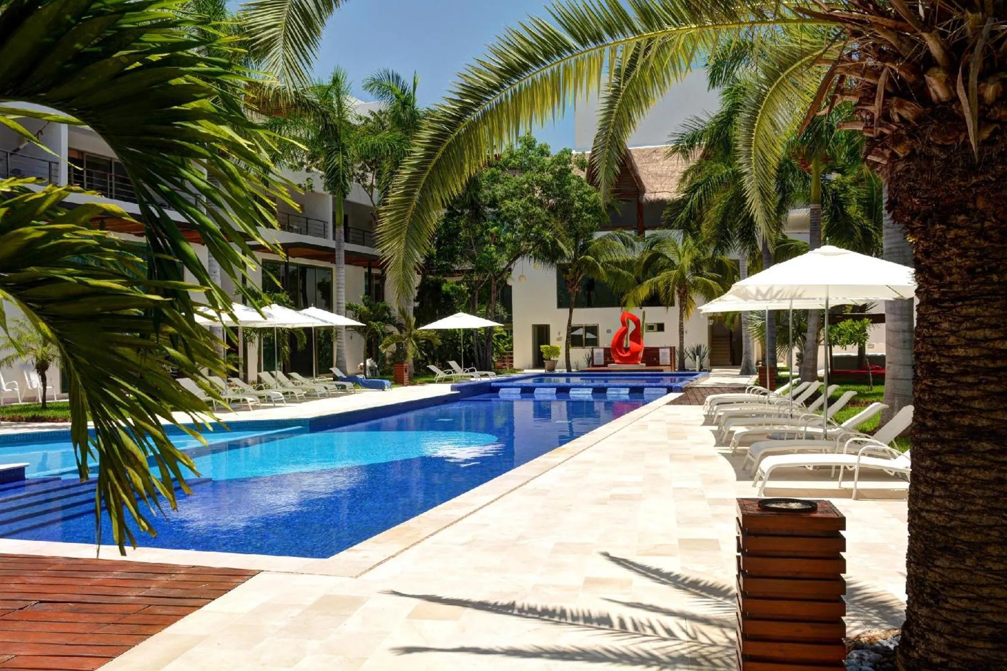 Pool view in Luxurious & Central Condo In Playa Steps From The Beach