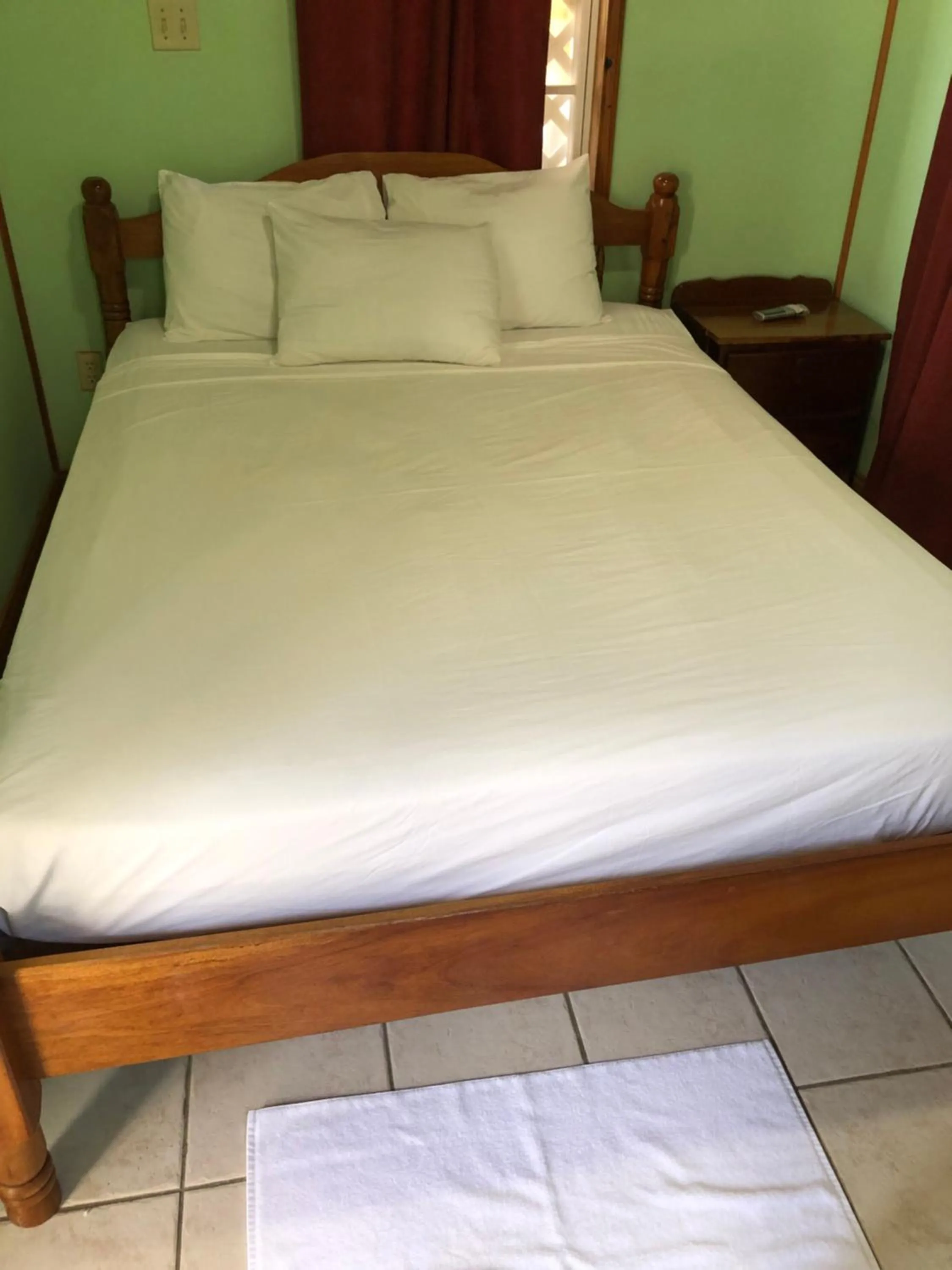 Bed in Blue Wave Guest House
