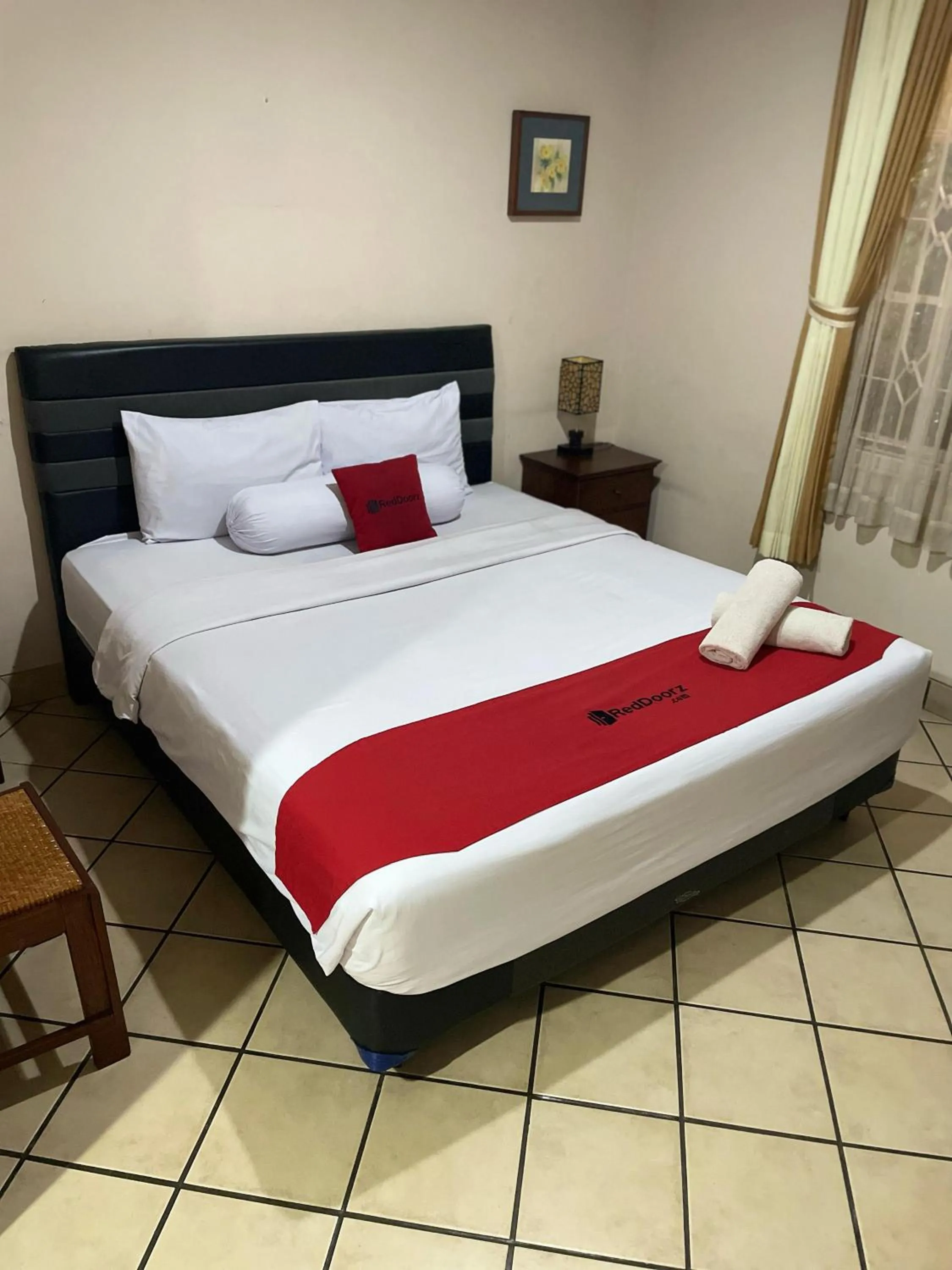 Bed in RedDoorz Plus near Parahyangan University