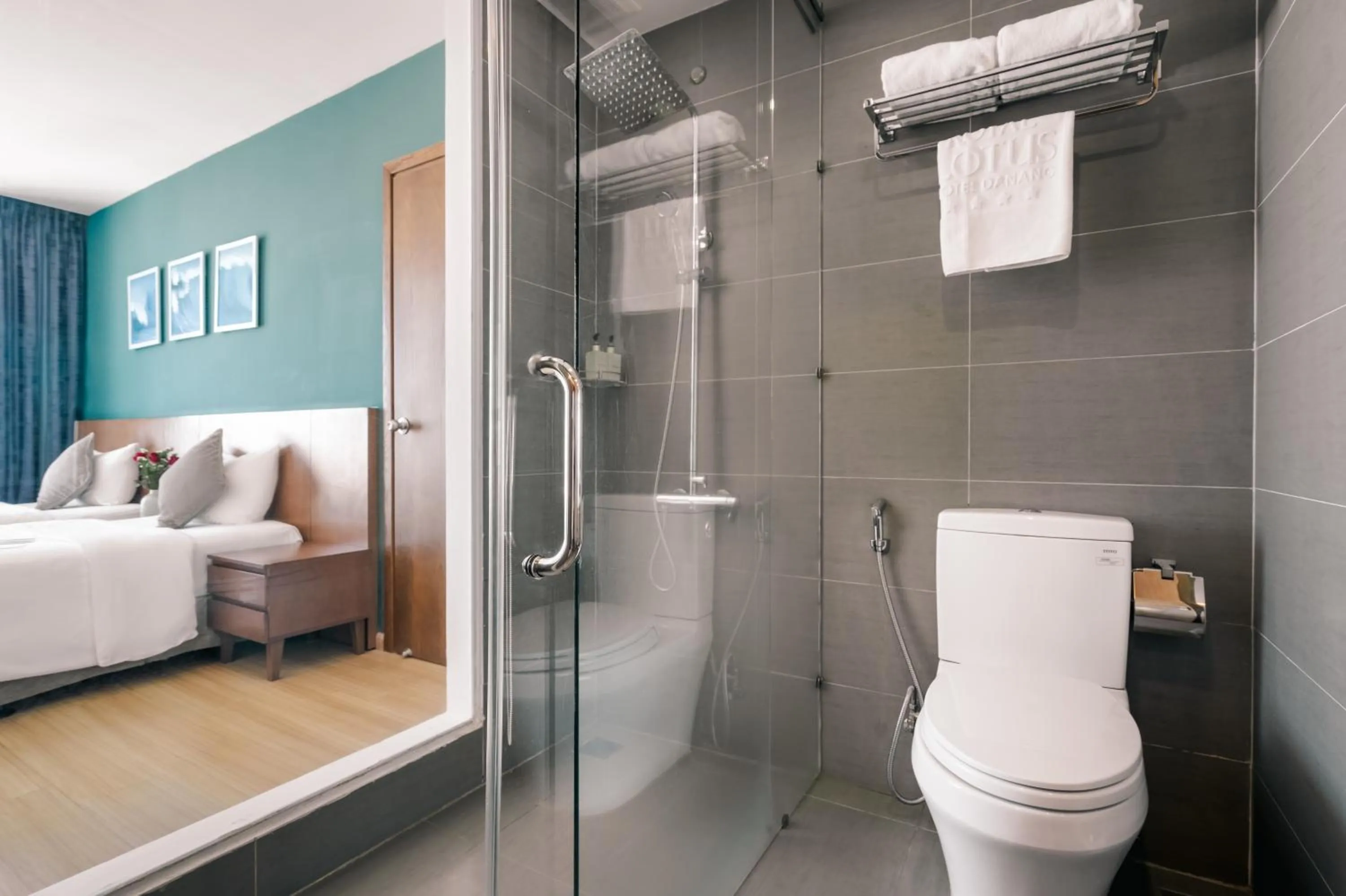 Bathroom, Bed in Royal Lotus Hotel Danang