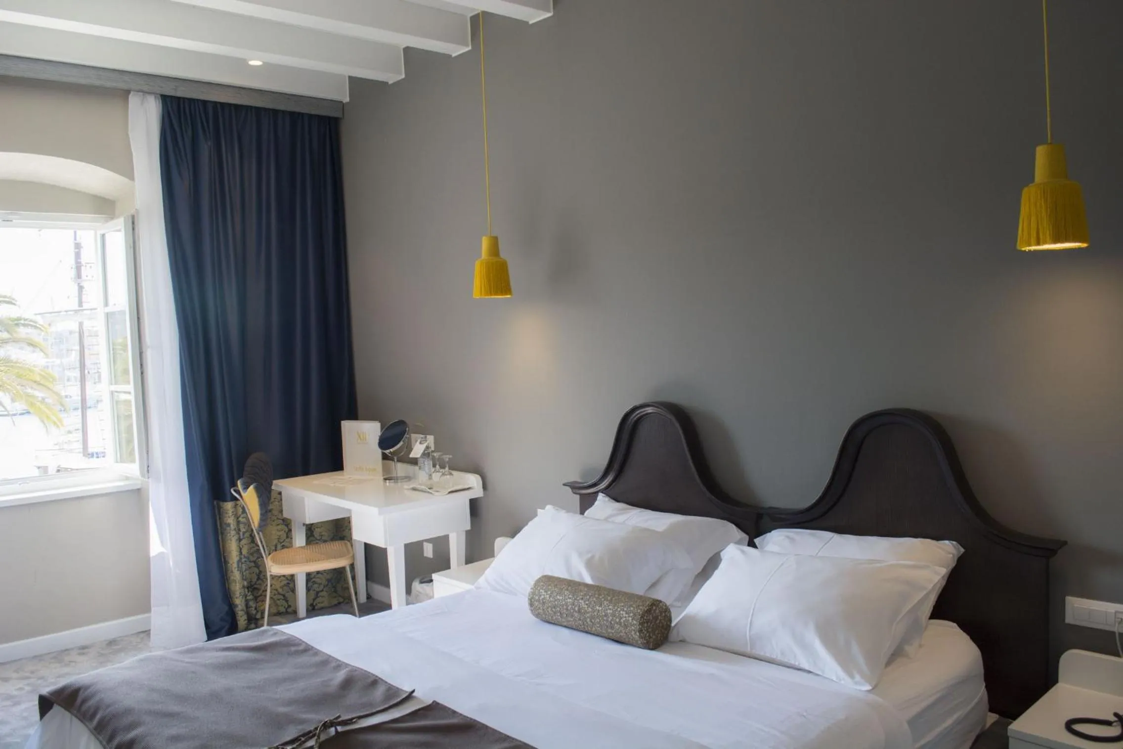 Bed in XII Century Heritage Hotel