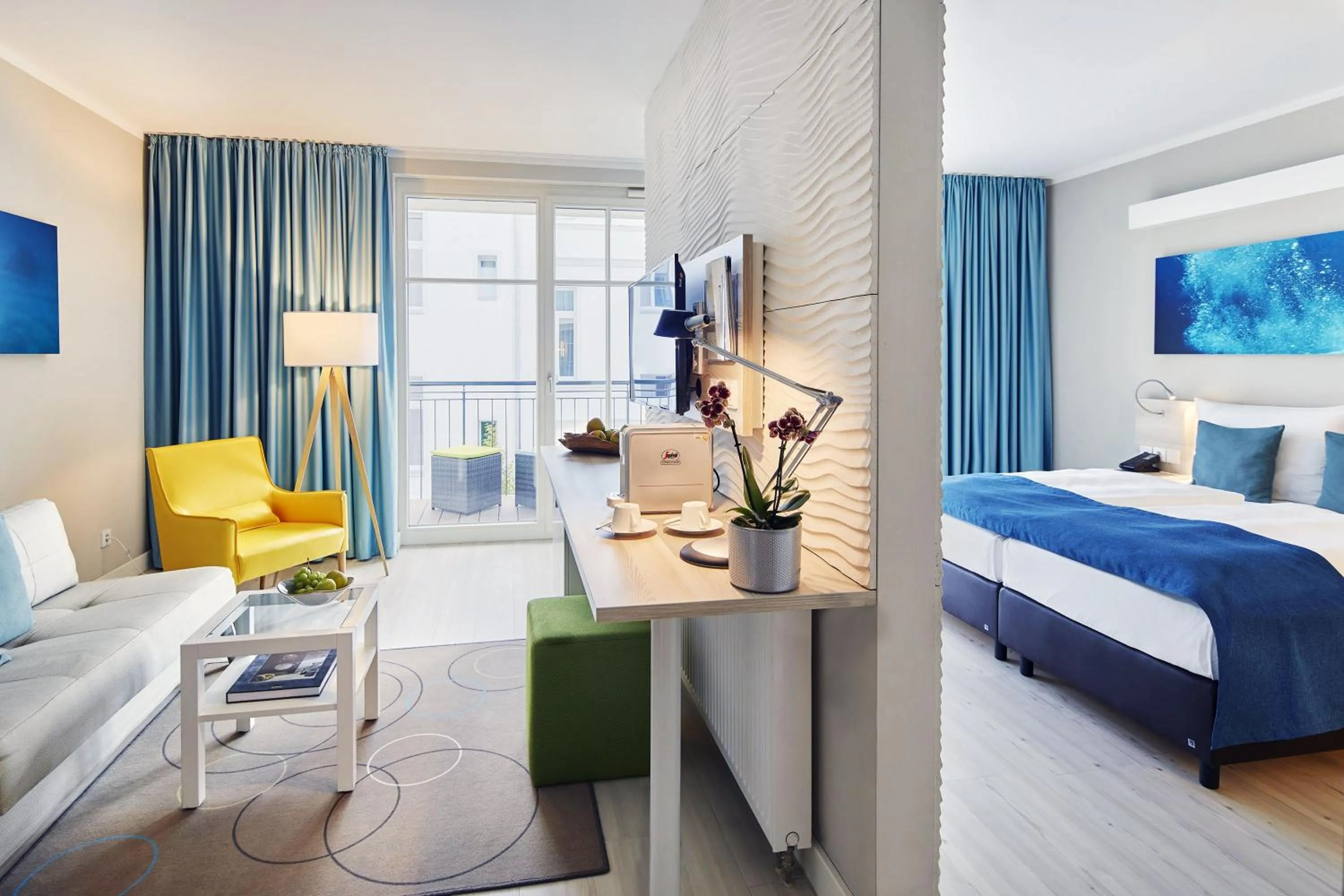 Photo of the whole room, Bed in SEETELHOTEL Kaiserstrand Beachhotel das Lifestyle-Hotel direkt am Strand