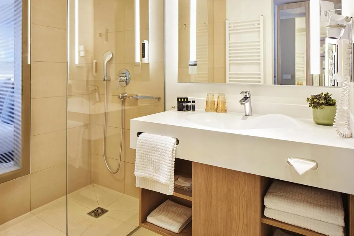 Bathroom in SEETELHOTEL Kaiserstrand Beachhotel das Lifestyle-Hotel direkt am Strand