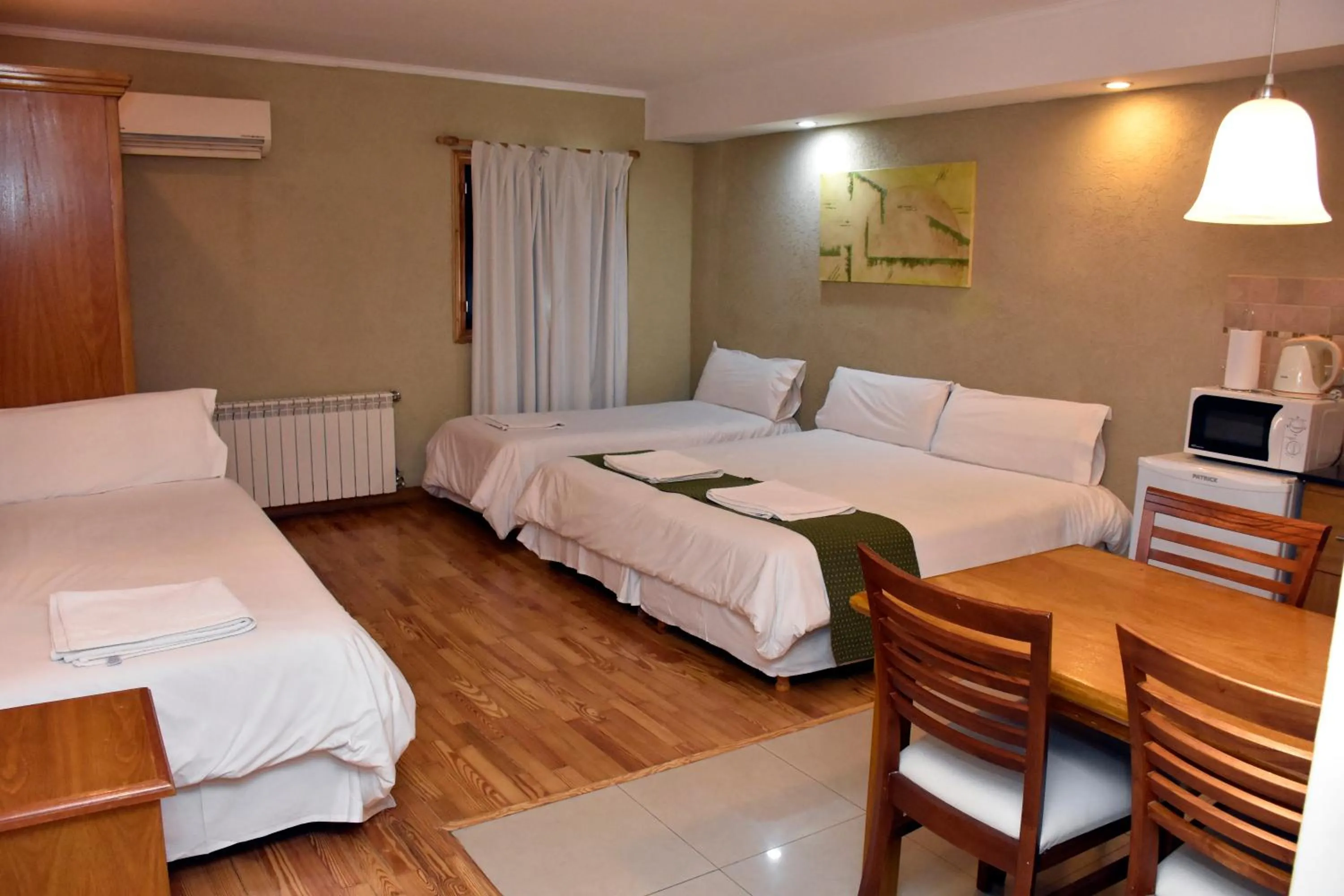 Premium Quadruple Room in Bahia Belgrano Suites