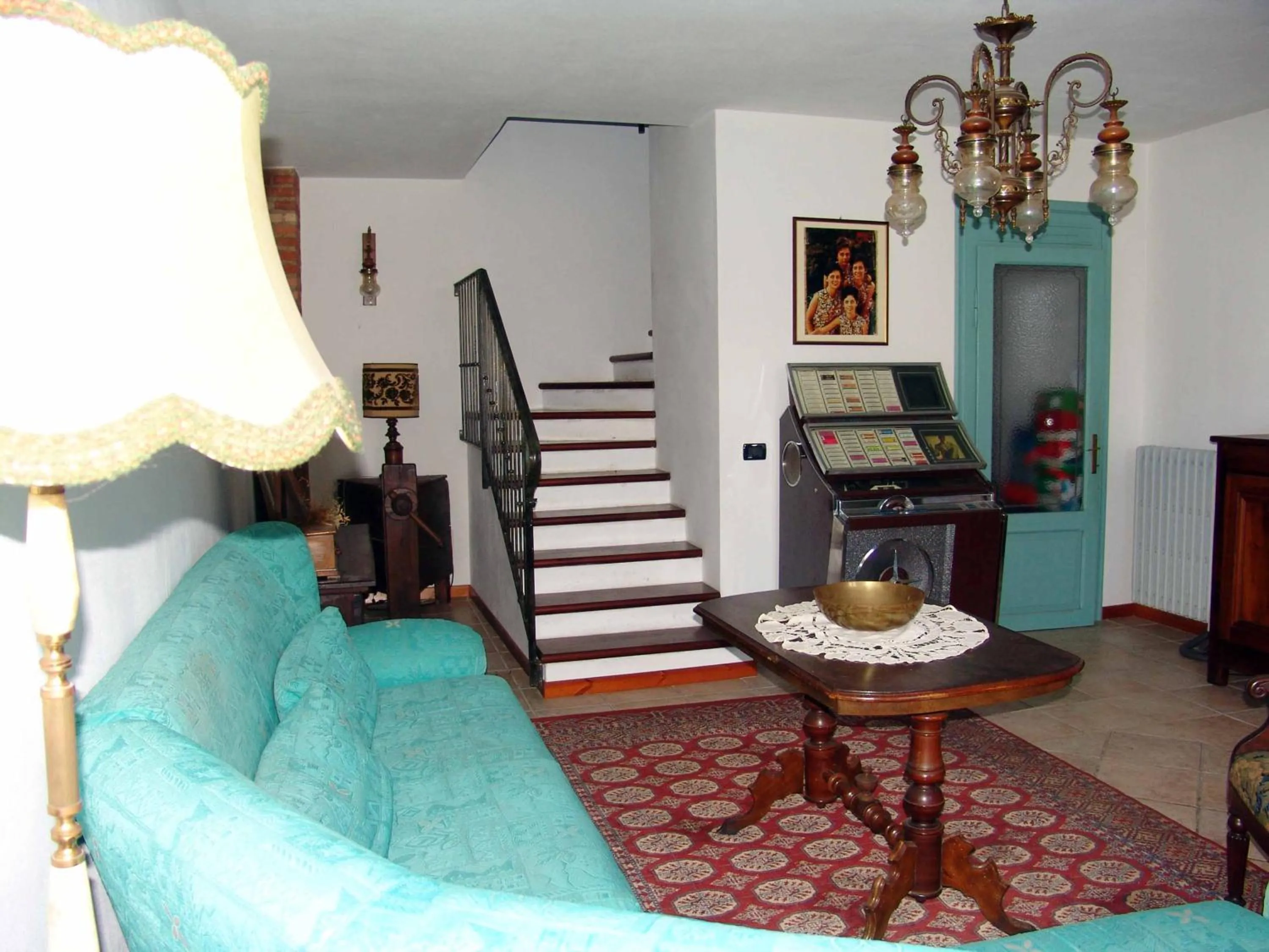 Communal lounge/ TV room in Casa Vacanze Cascina Campagnola
