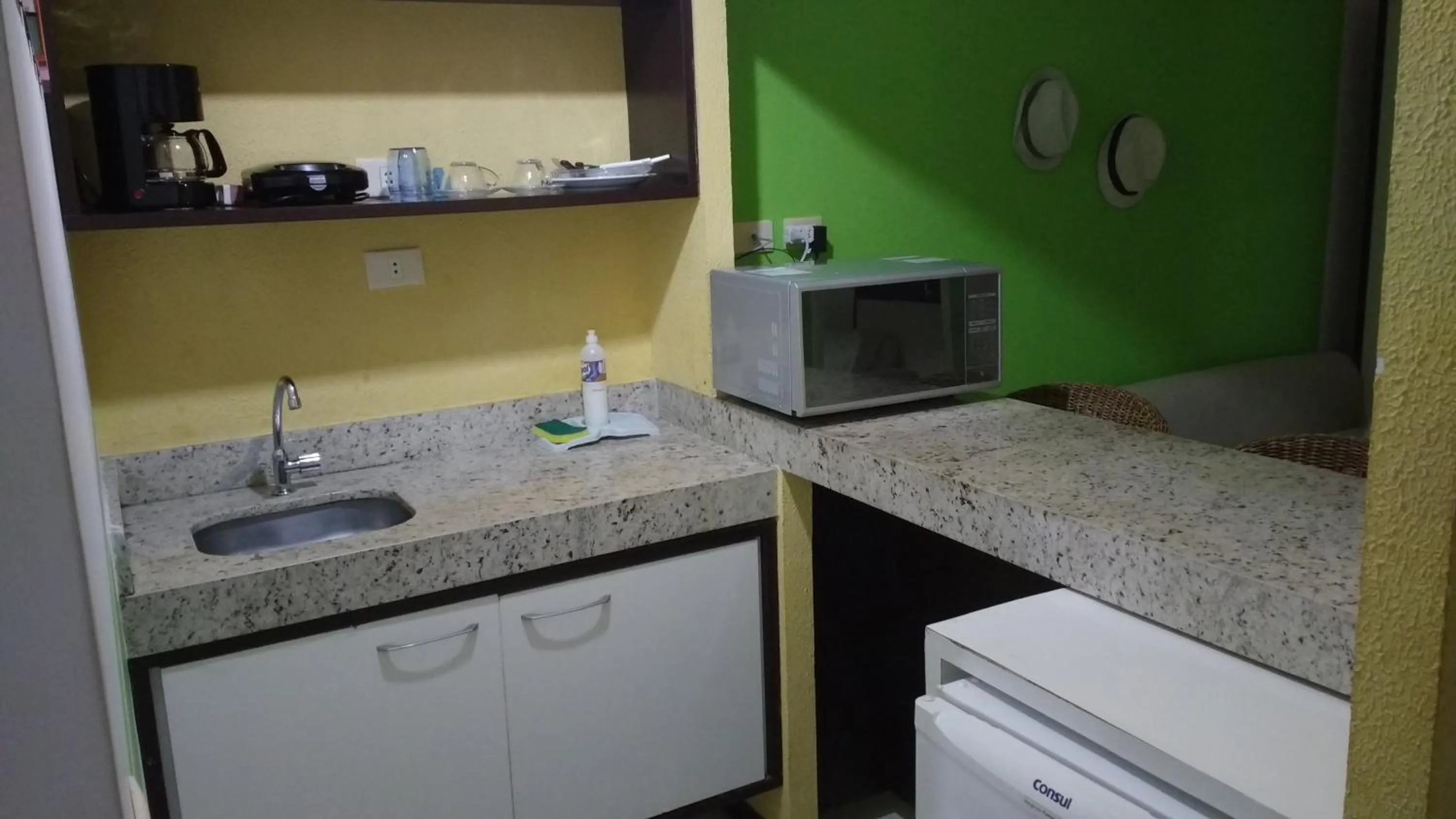 Kitchen or kitchenette in Pipa's Bay Apartamentos