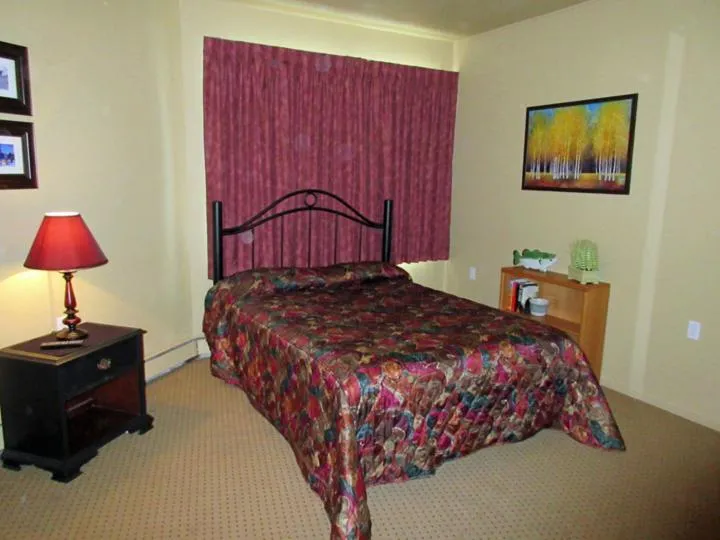 Bed in Soda Butte Lodge