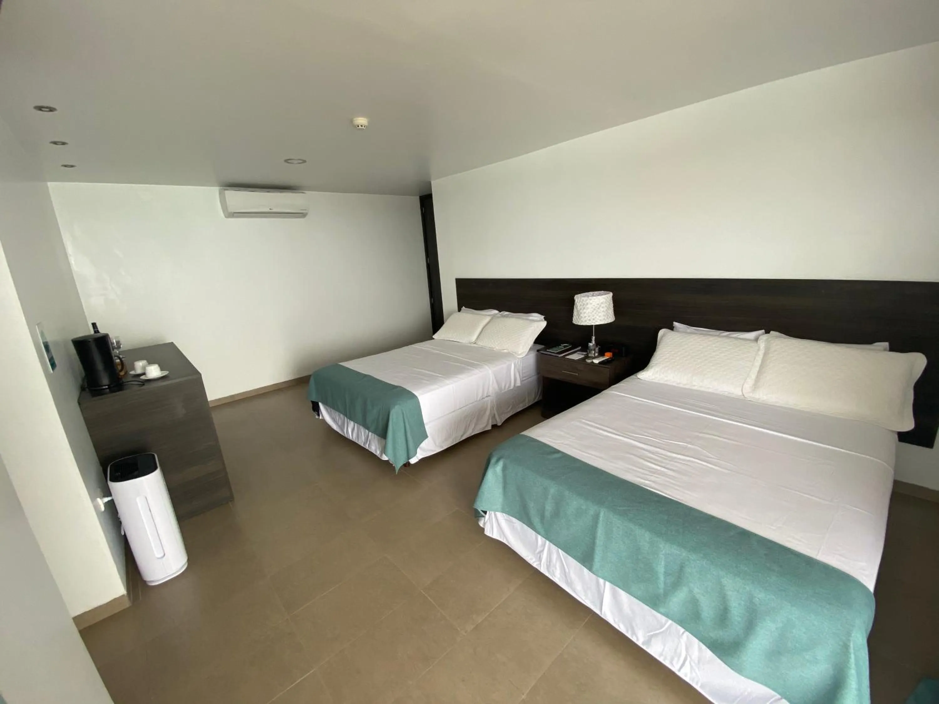 Bed in Galapagos Sunset Hotel