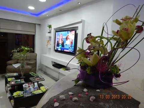 Communal lounge/ TV room in Gran Hotel Napoleón