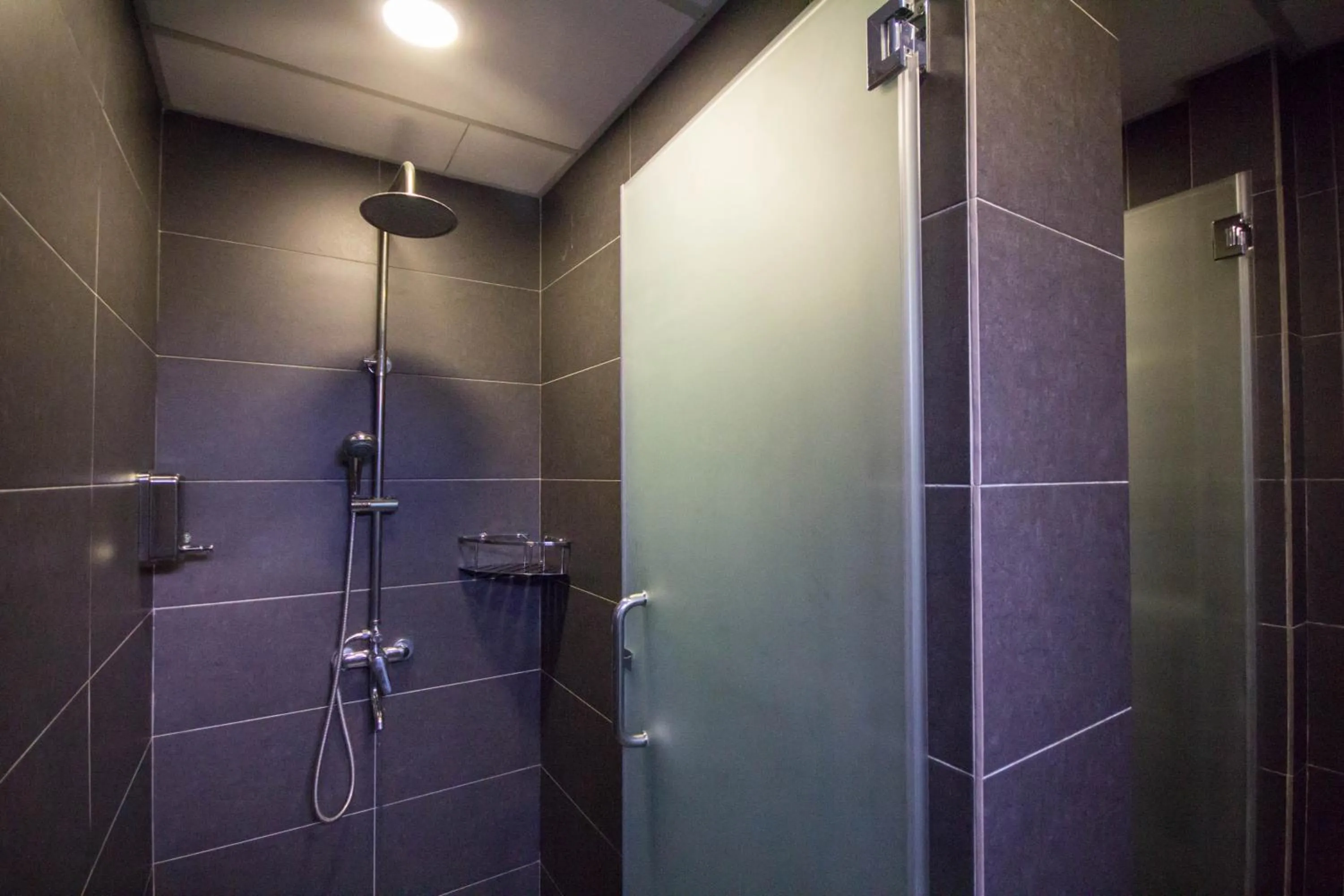 Bathroom in M Qube Hotel